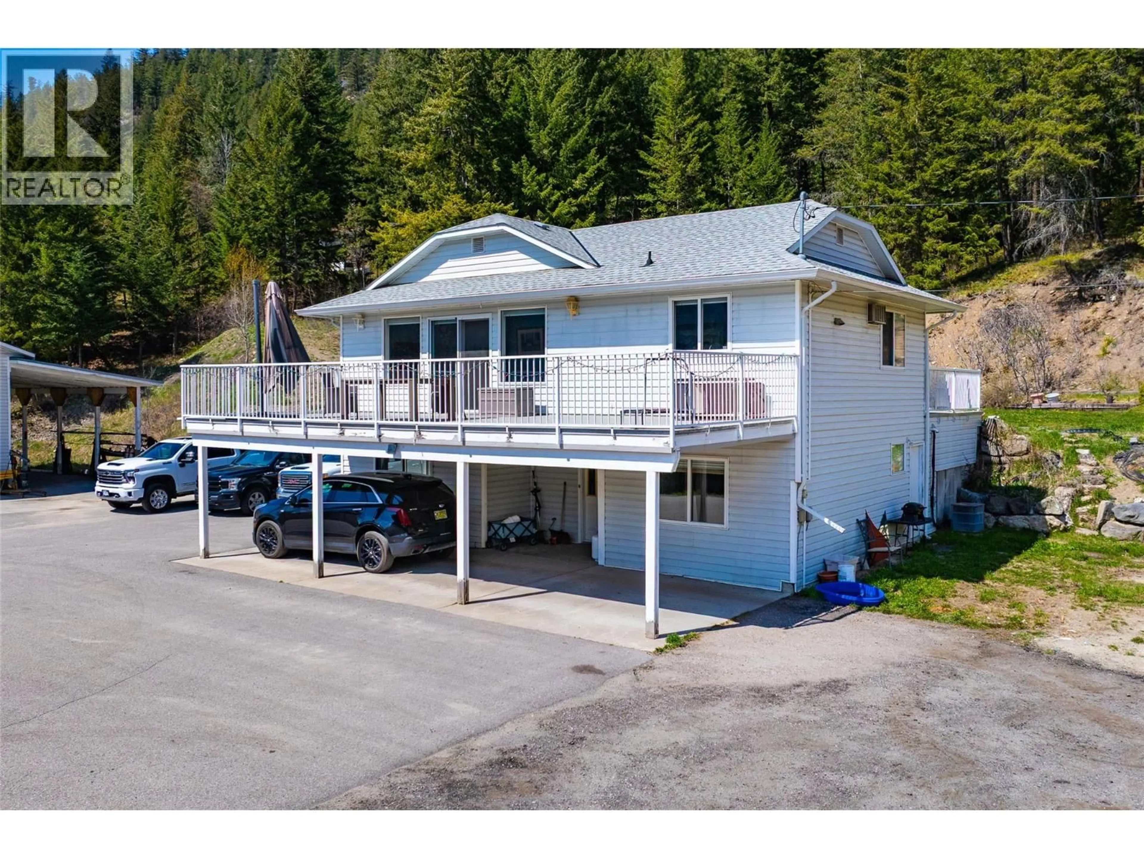A pic from outside/outdoor area/front of a property/back of a property/a pic from drone, unknown for 7114 GOSHAWK ROAD, Kelowna British Columbia V1P1H9