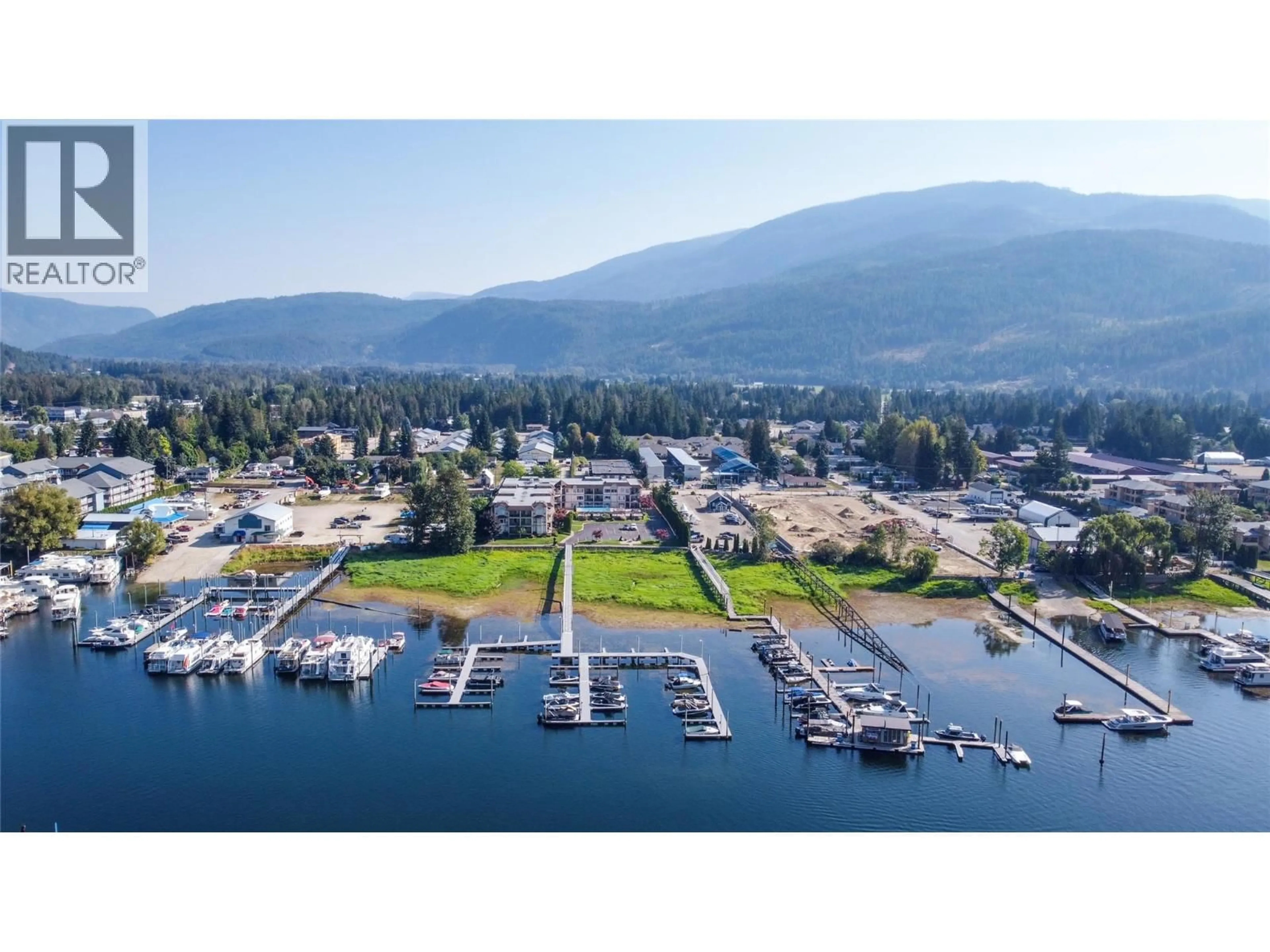 A pic from outside/outdoor area/front of a property/back of a property/a pic from drone, water/lake/river/ocean view for 111 - 1002 RIVERSIDE AVENUE, Sicamous British Columbia V0E2V1