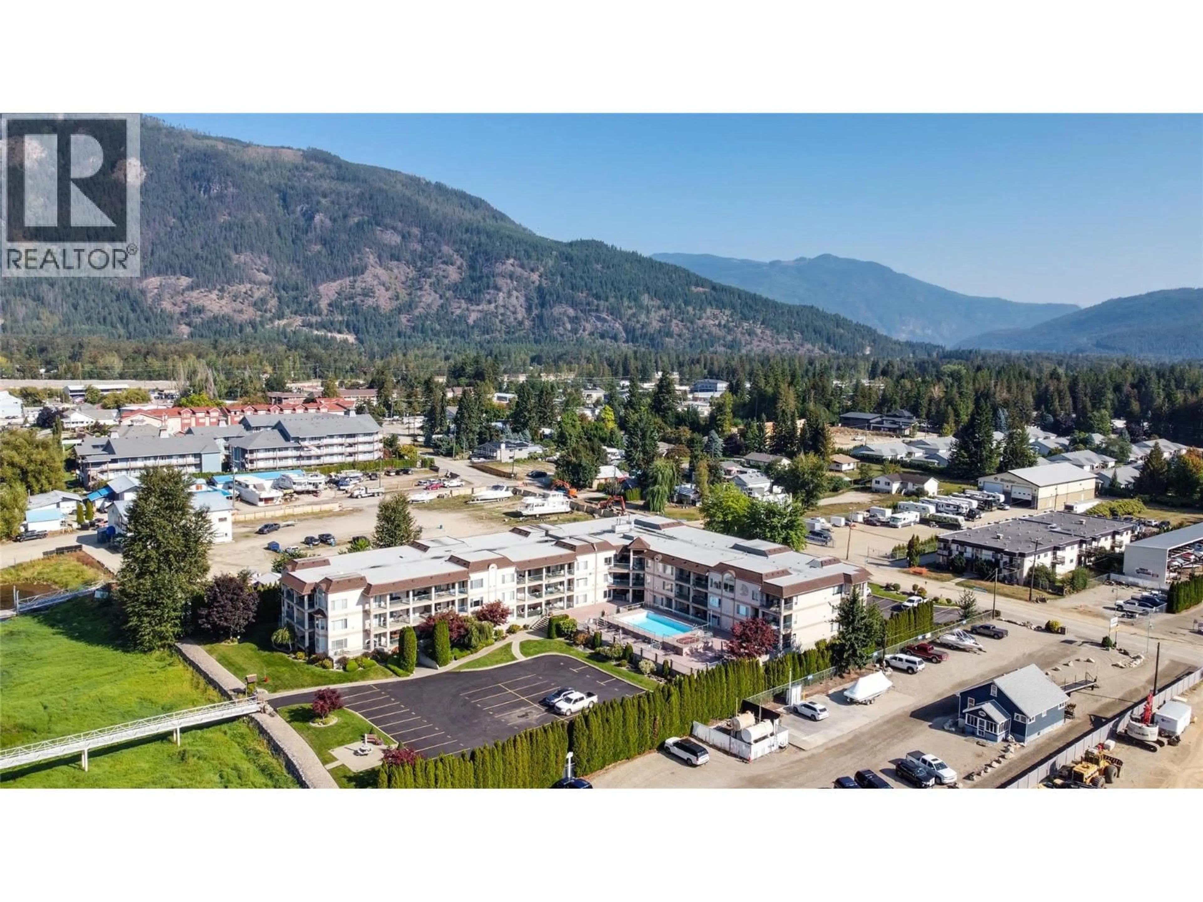 A pic from outside/outdoor area/front of a property/back of a property/a pic from drone, mountain view for 111 - 1002 RIVERSIDE AVENUE, Sicamous British Columbia V0E2V1