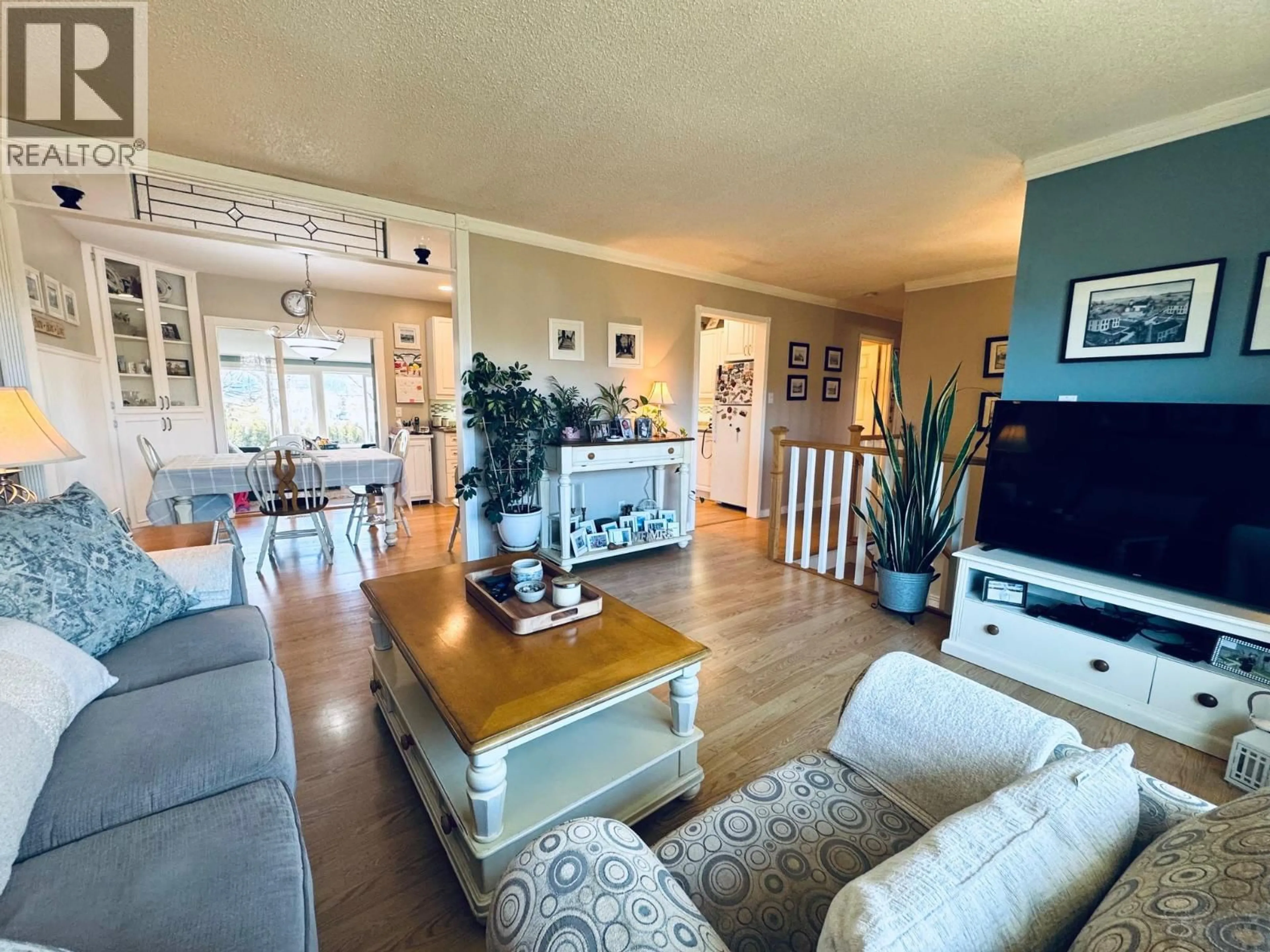 Living room with furniture, wood/laminate floor for 1969 ARMSTRONG STREET, Merritt British Columbia V1K1E7
