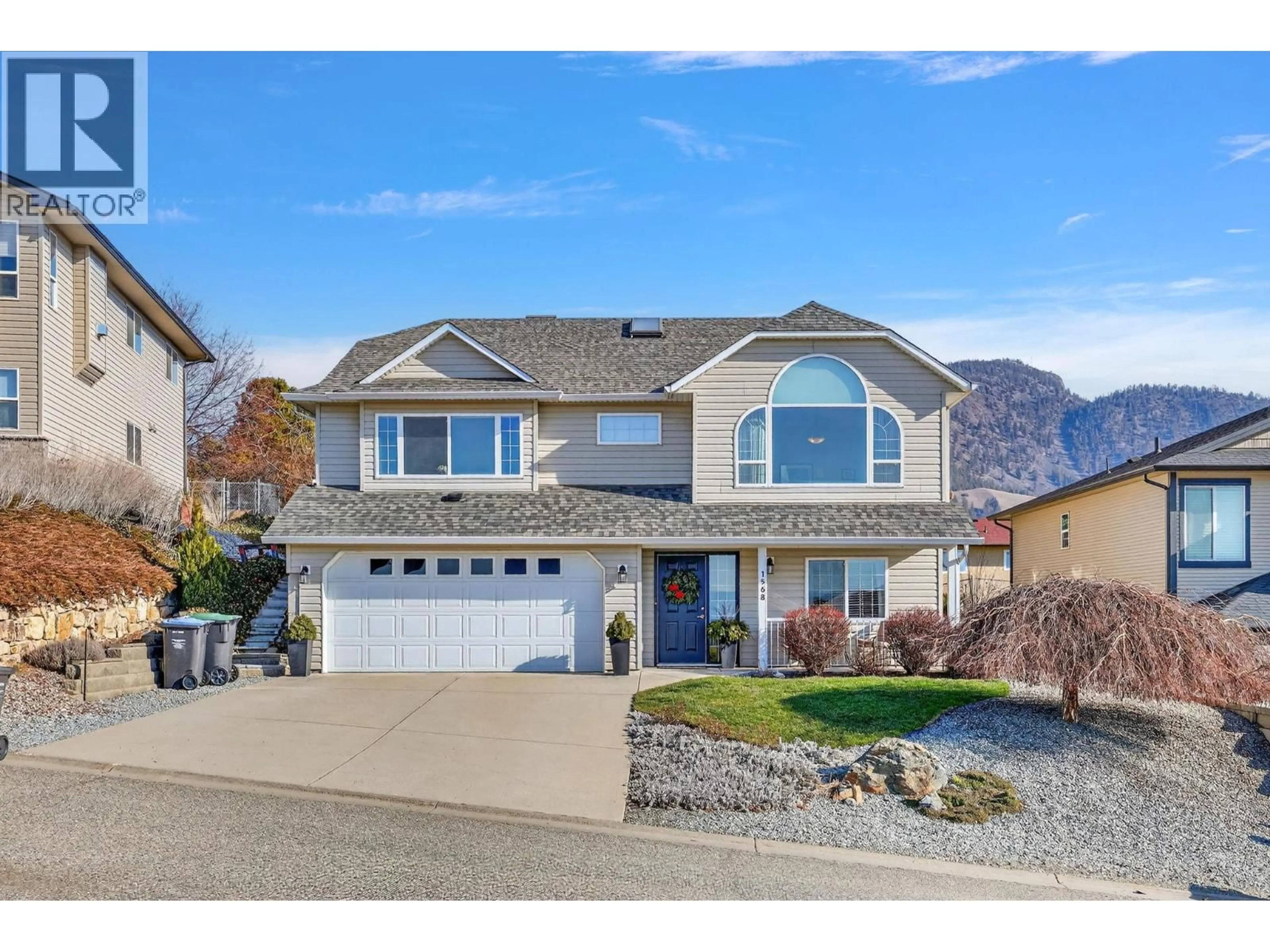 Home with vinyl exterior material, mountain view for 1568 LONGLEY CRESCENT, Kelowna British Columbia V1P1M9