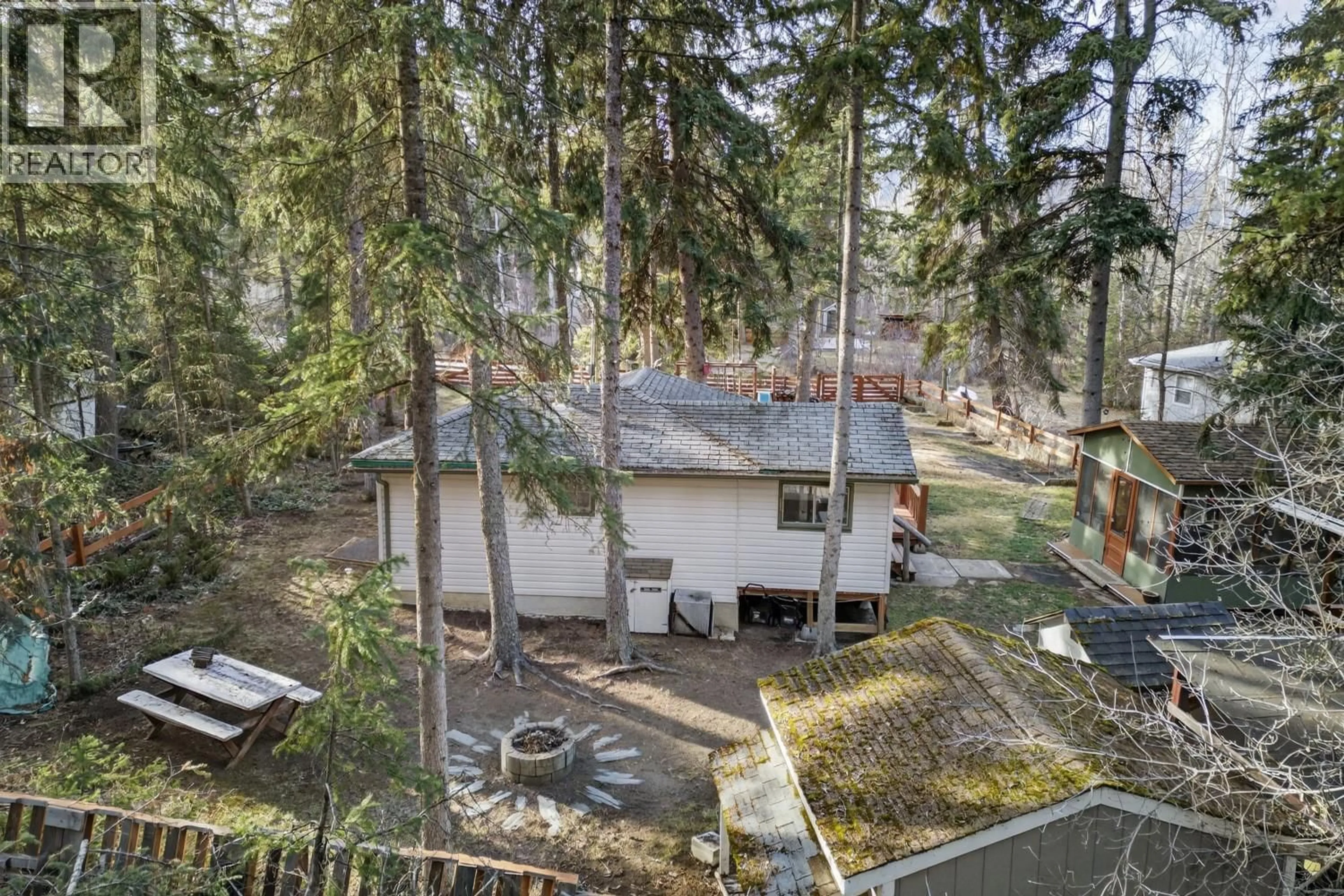 A pic from outside/outdoor area/front of a property/back of a property/a pic from drone, forest/trees view for 4878 OGILVEY AVENUE, Fairmont Hot Springs British Columbia V0B1L1