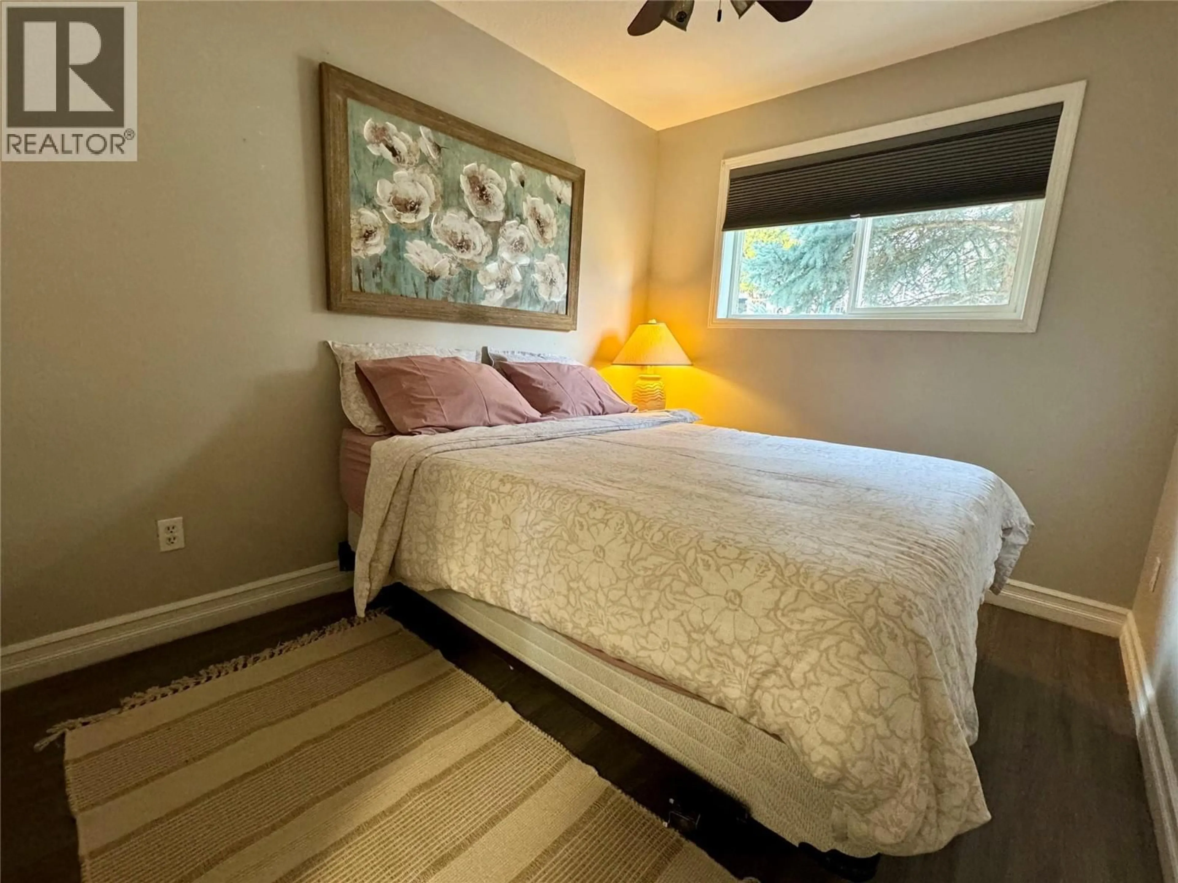 Bedroom with bed, wood/laminate floor for 1885 GRANDVIEW AVENUE, Lumby British Columbia V0E2G0