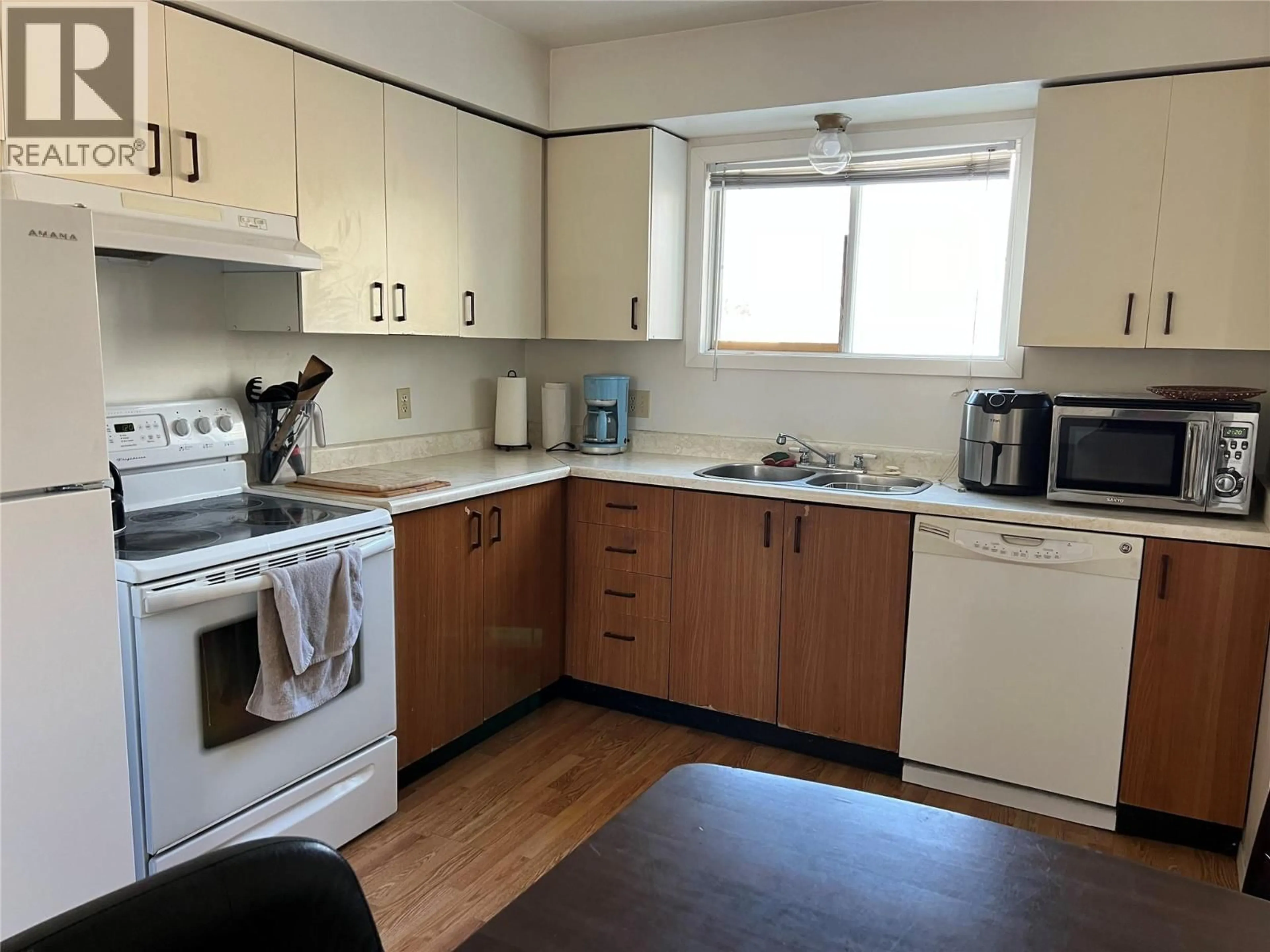 Standard kitchen, wood/laminate floor for 242 SPIEKER AVENUE, Tumbler Ridge British Columbia V0C2W0