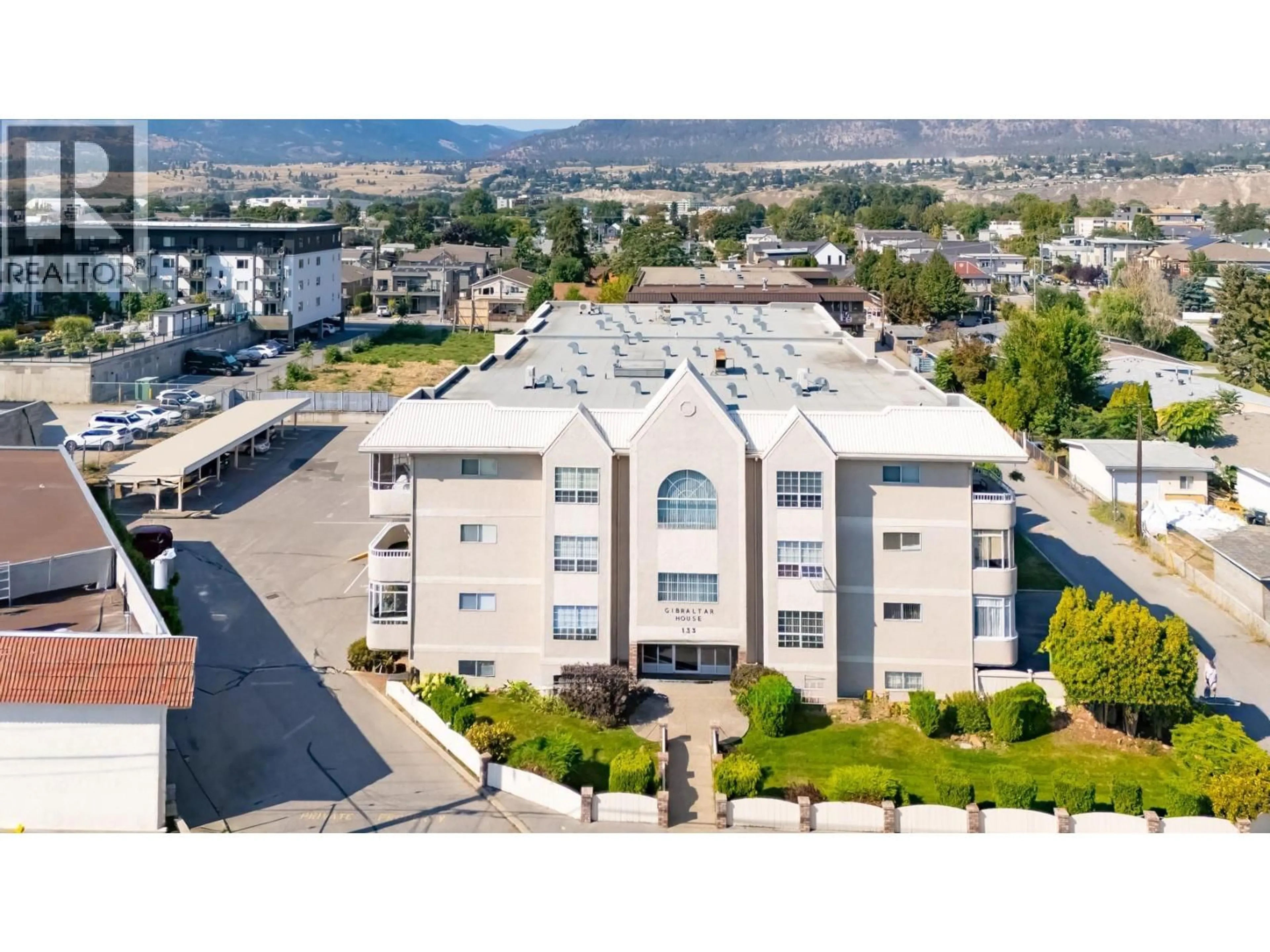 A pic from outside/outdoor area/front of a property/back of a property/a pic from drone, unknown for 307 - 133 WINNIPEG STREET, Penticton British Columbia V2A6L2