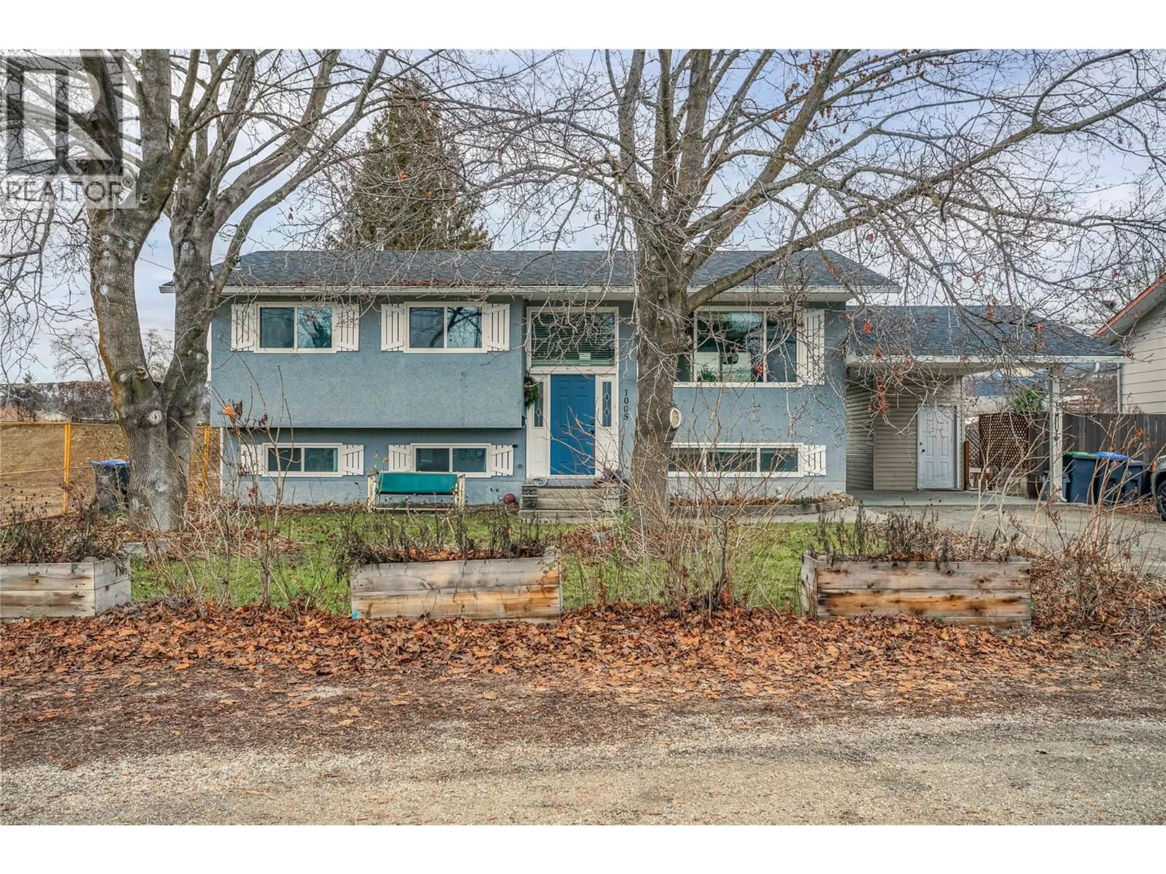 Home with vinyl exterior material, street for 1005 MITCHELL ROAD, Kelowna British Columbia V1X3W7