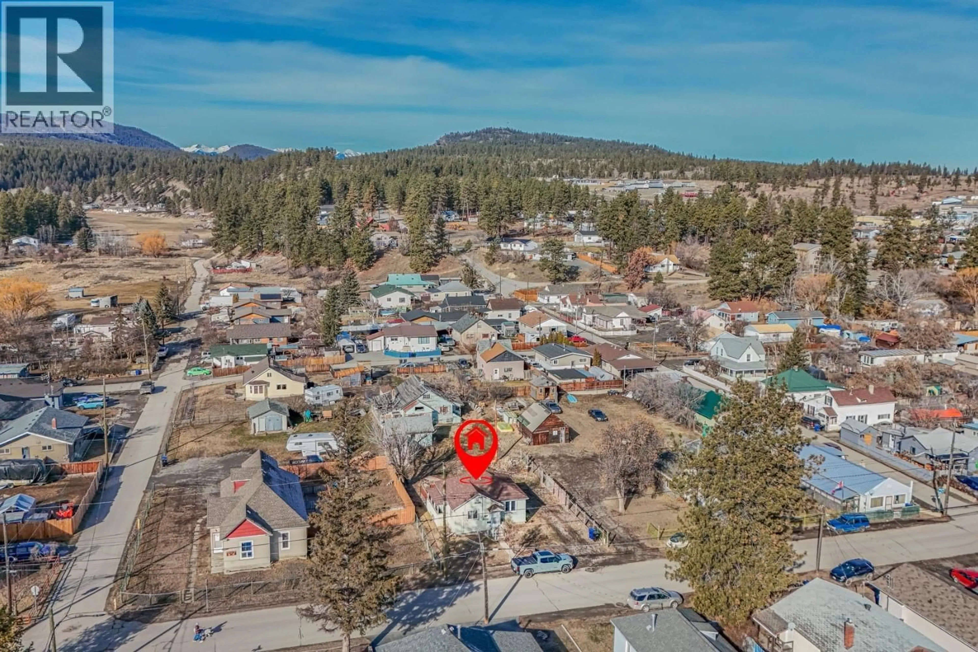 A pic from outside/outdoor area/front of a property/back of a property/a pic from drone, mountain view for 315 BRIAR AVENUE NORTHWEST, Cranbrook British Columbia V1C4B3