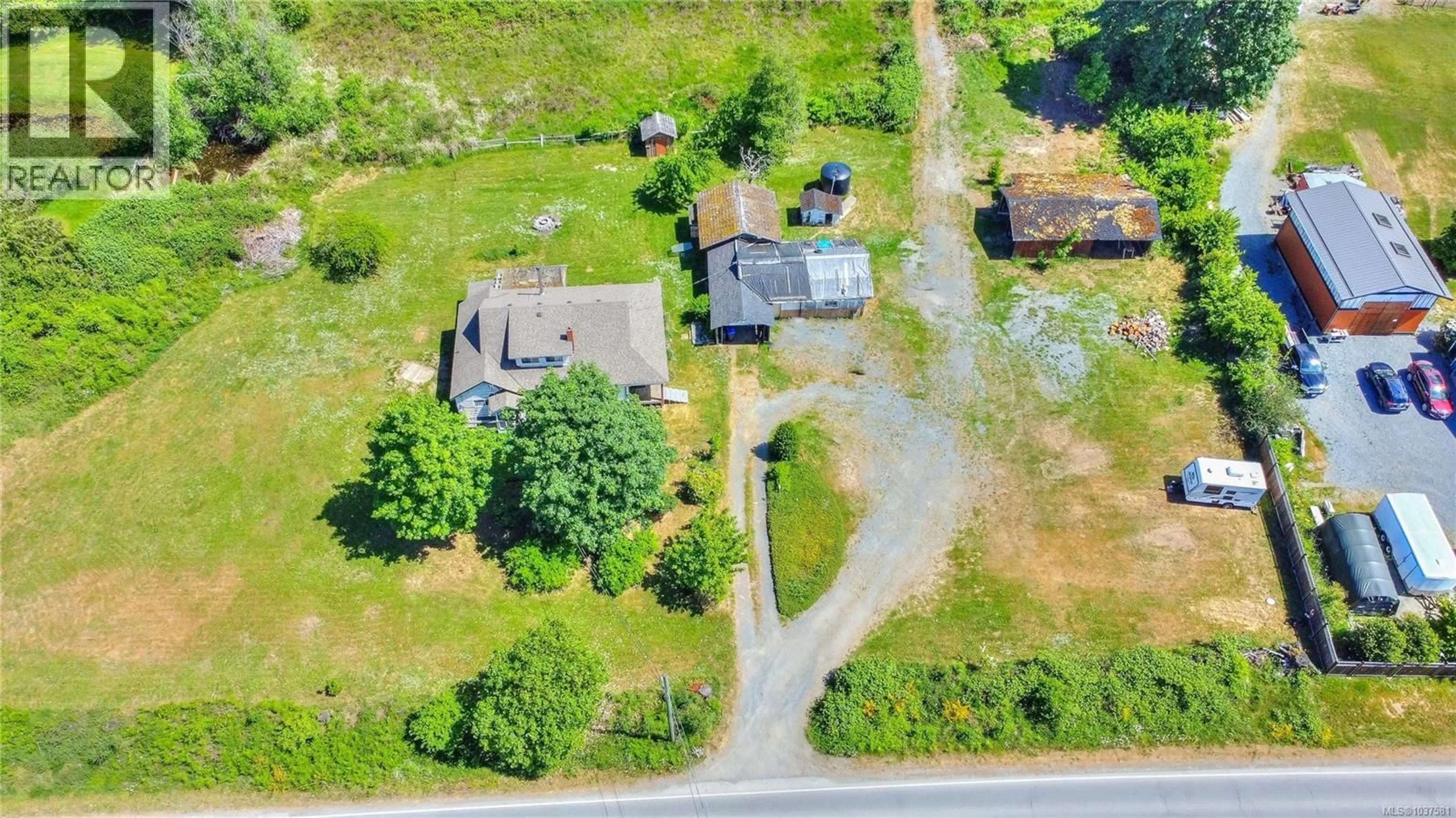 A pic from outside/outdoor area/front of a property/back of a property/a pic from drone, street for 2348 YELLOW POINT ROAD, Nanaimo British Columbia V9X1W5