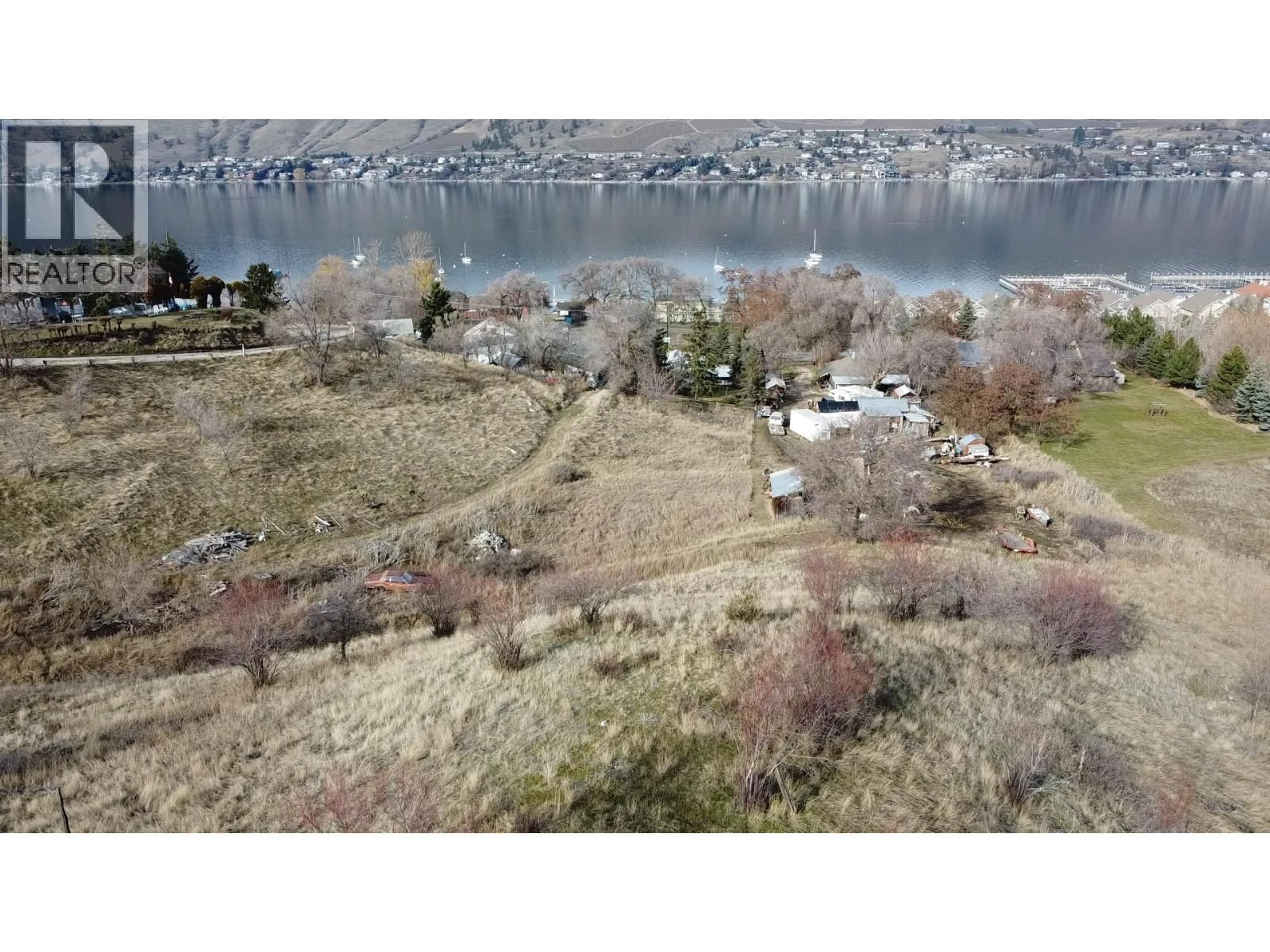 A pic from outside/outdoor area/front of a property/back of a property/a pic from drone, water/lake/river/ocean view for 7782 OKANAGAN LANDING ROAD, Vernon British Columbia V1H1H2