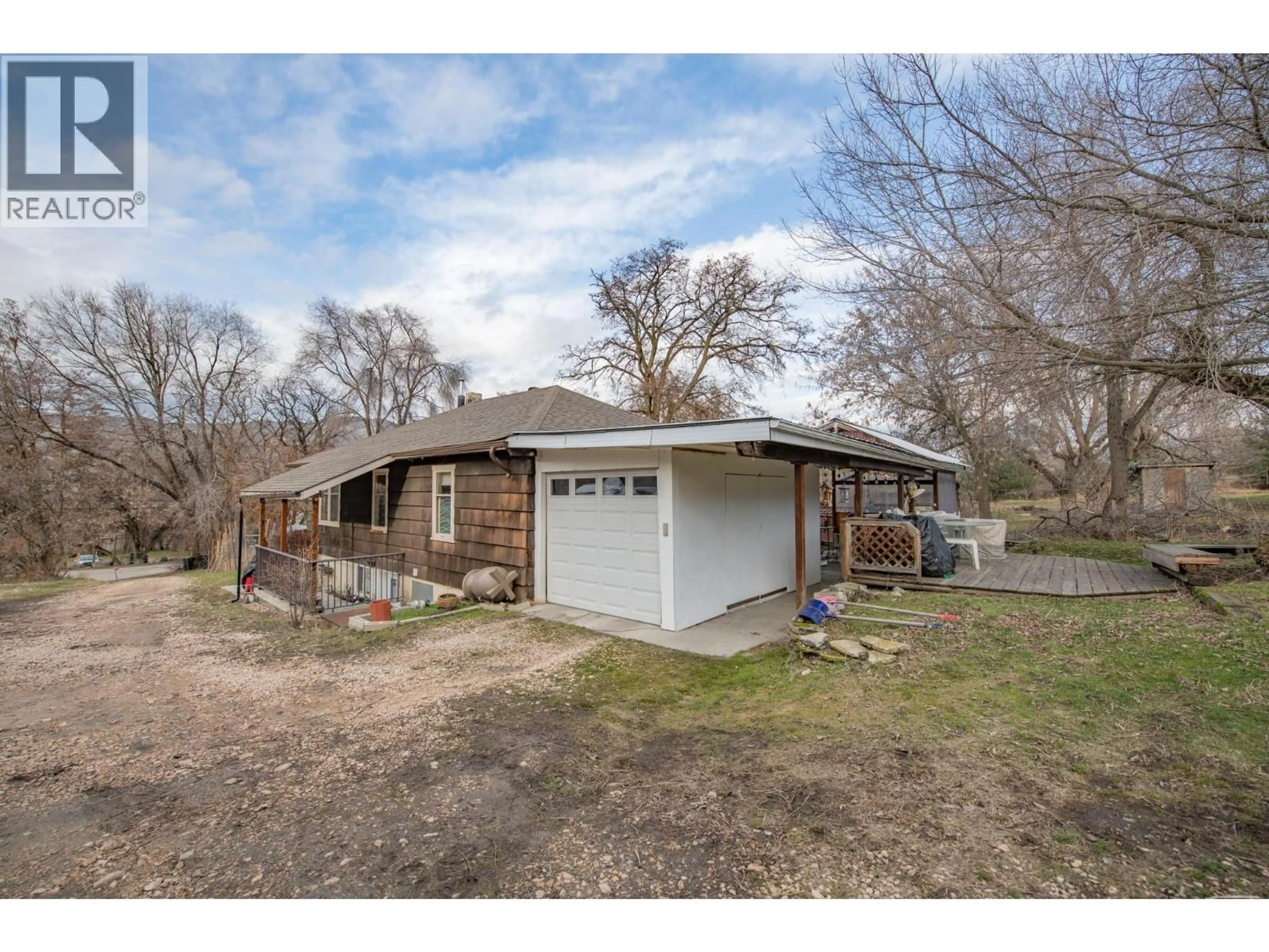 A pic from outside/outdoor area/front of a property/back of a property/a pic from drone, unknown for 7782 OKANAGAN LANDING ROAD, Vernon British Columbia V1H1H2