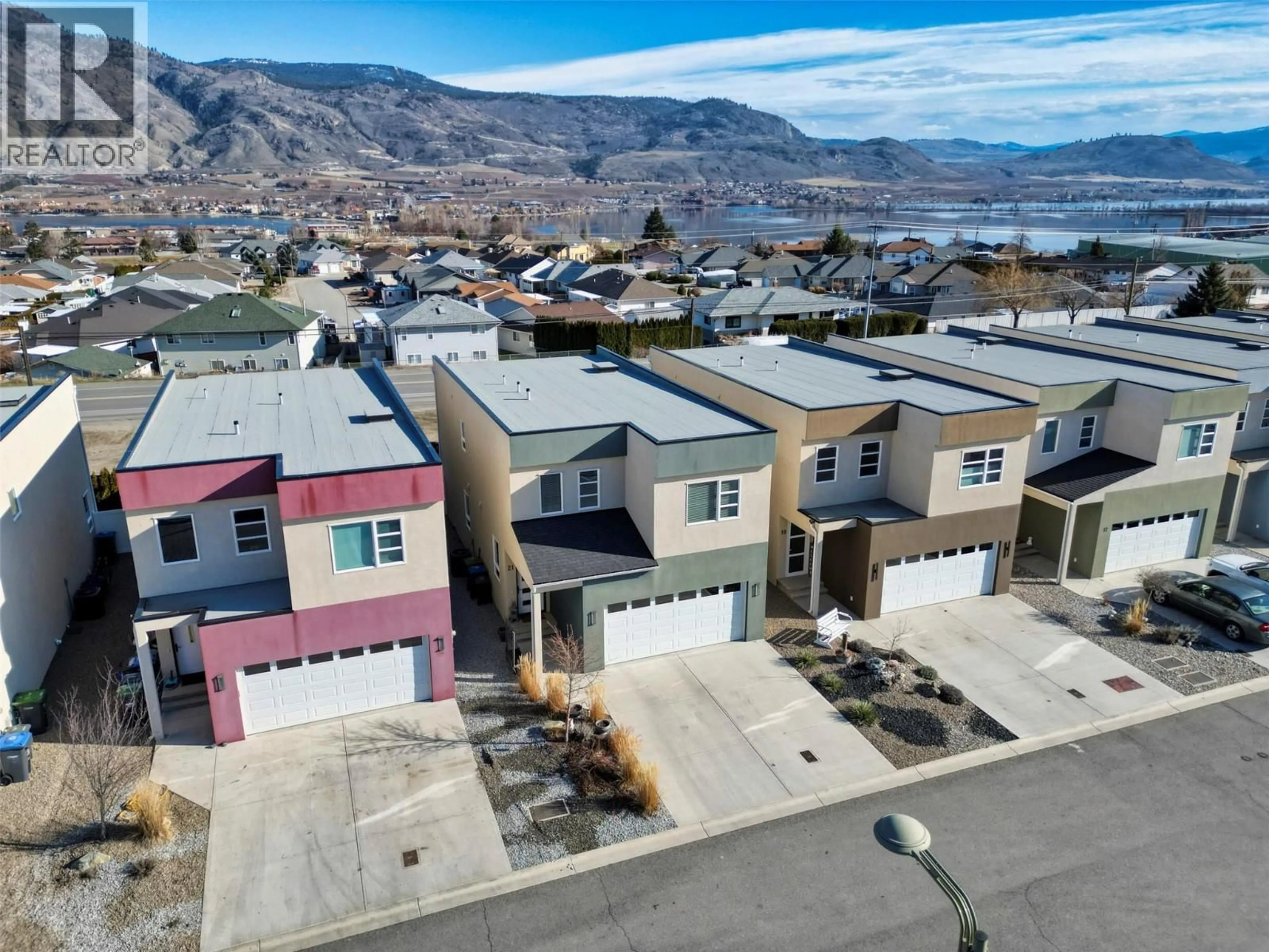 A pic from outside/outdoor area/front of a property/back of a property/a pic from drone, mountain view for 21 RAVEN COURT, Osoyoos British Columbia V0H1V5