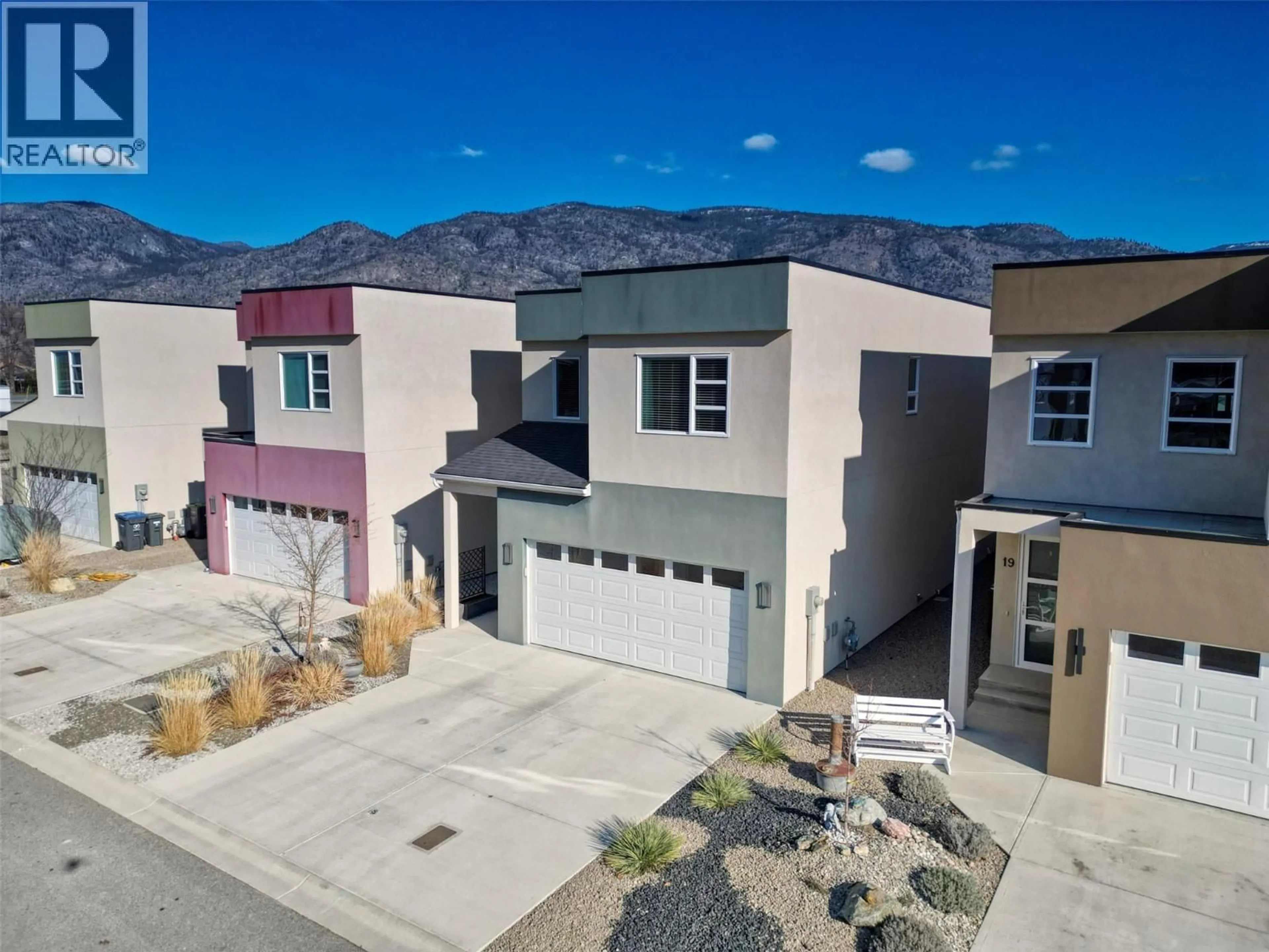 A pic from outside/outdoor area/front of a property/back of a property/a pic from drone, mountain view for 21 RAVEN COURT, Osoyoos British Columbia V0H1V5