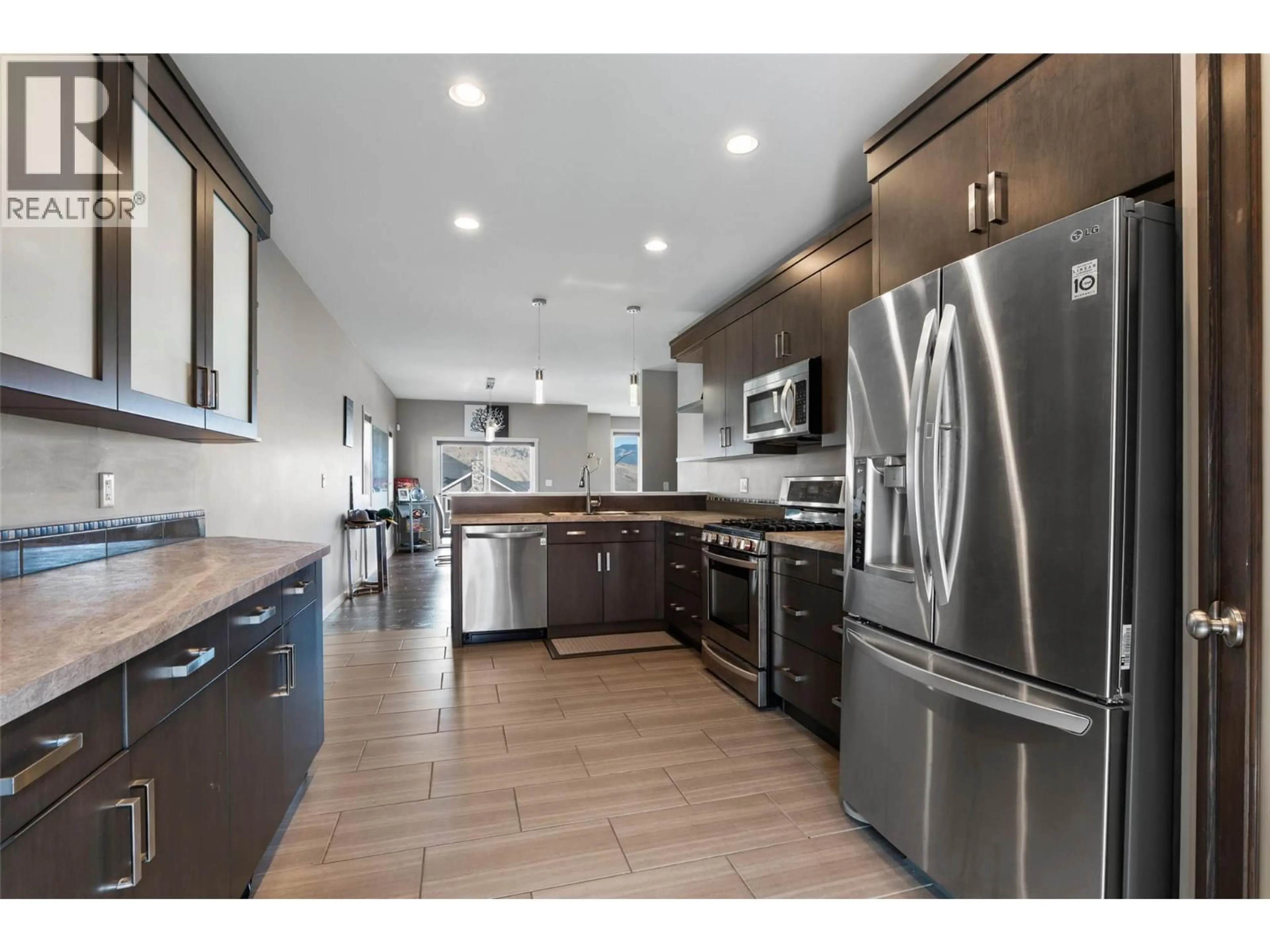 Open concept kitchen, ceramic/tile floor for 2209 SADDLEBACK DRIVE, Kamloops British Columbia V2B0G7