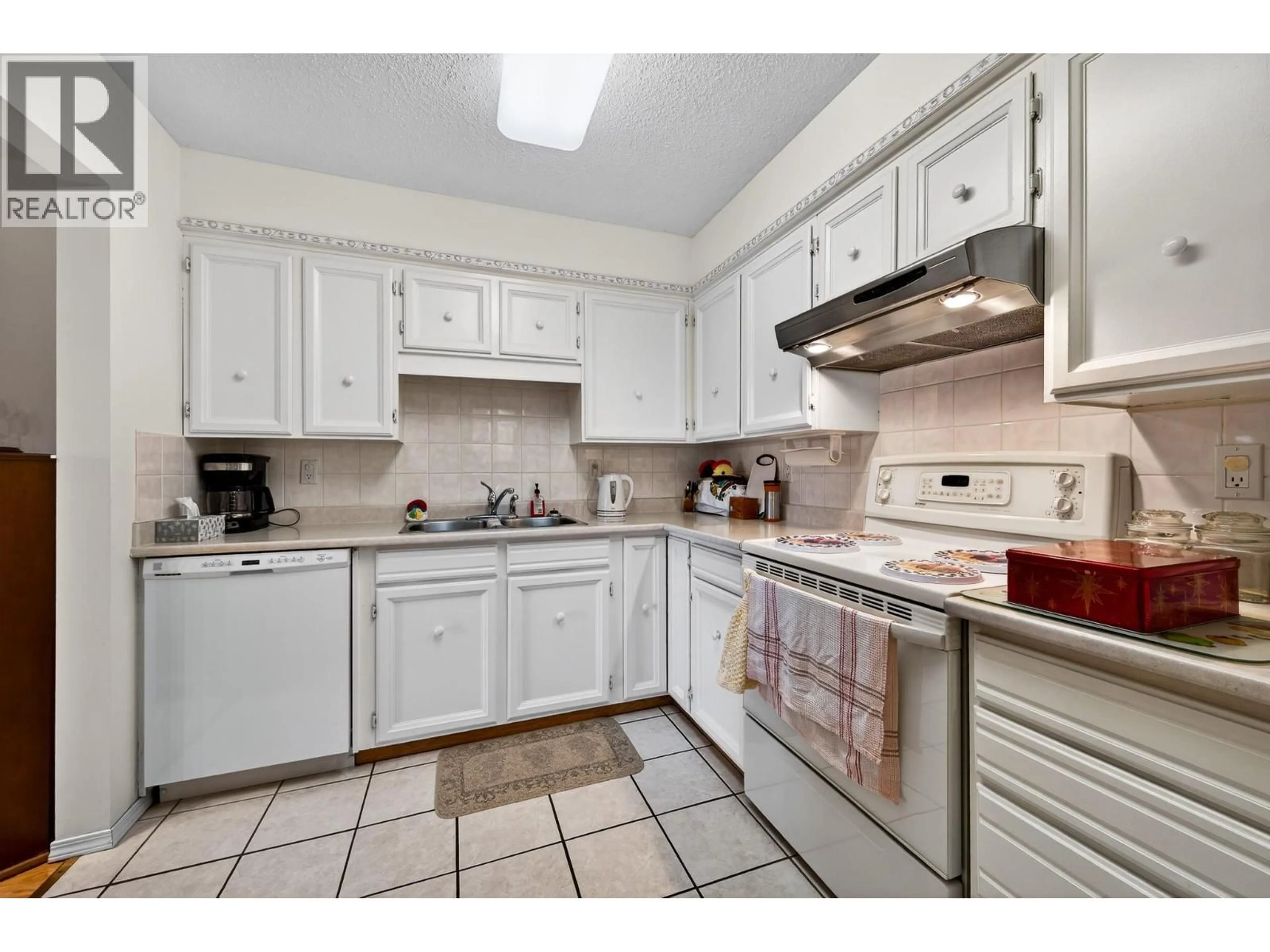 Standard kitchen, ceramic/tile floor for 104 - 411 NICOLA STREET, Kamloops British Columbia V2C2P7