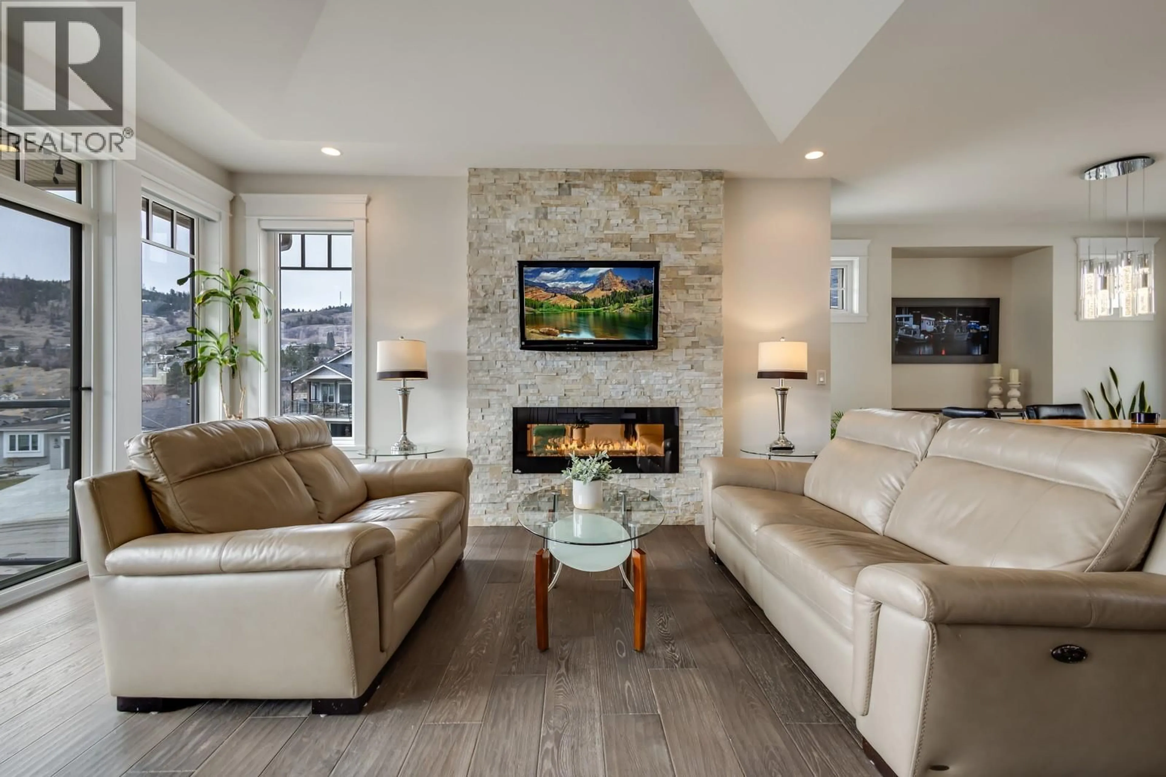 Living room with furniture, ceramic/tile floor for 7229 EDGEWATER PLACE, Coldstream British Columbia V1B4C5