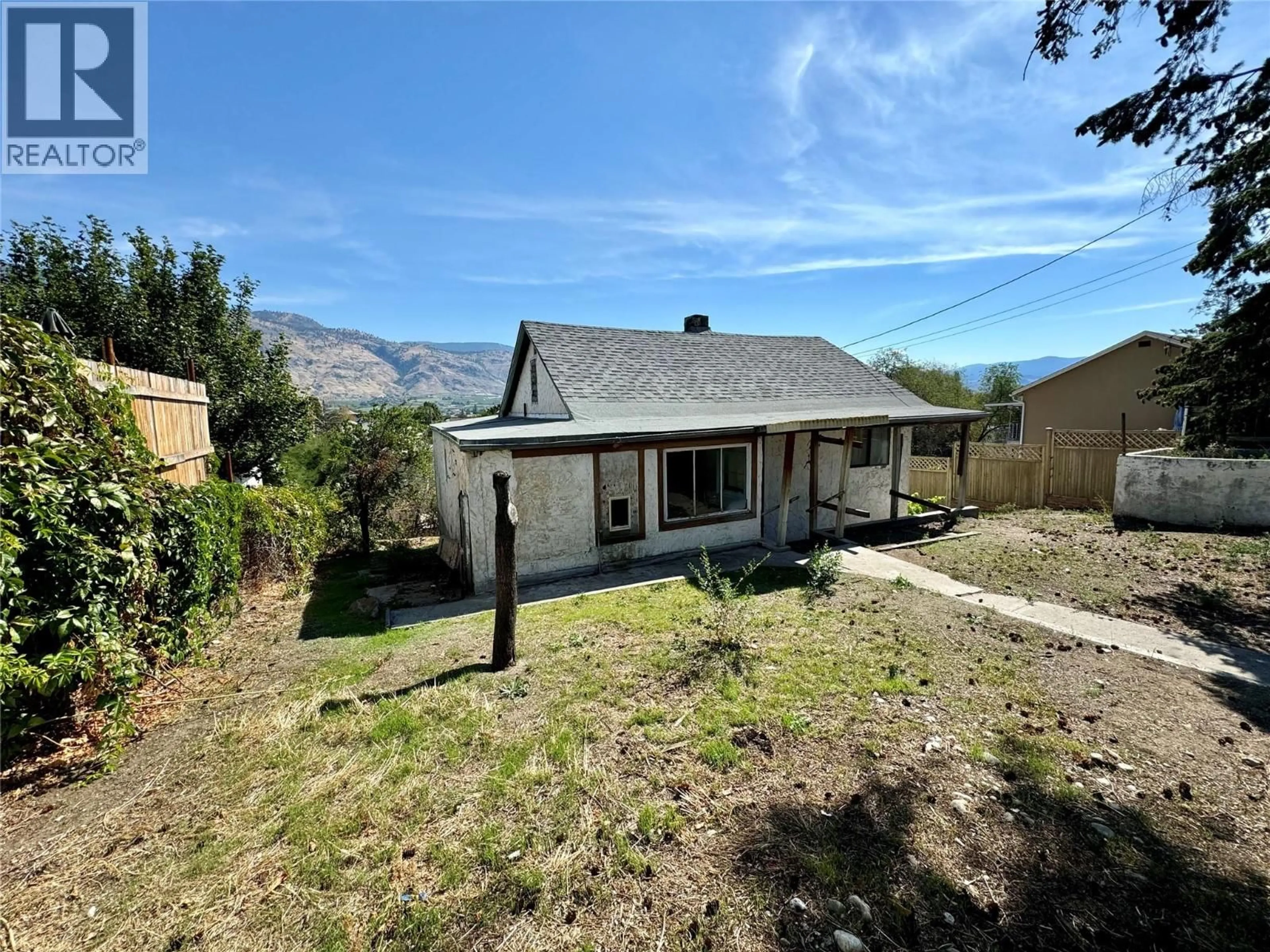 A pic from outside/outdoor area/front of a property/back of a property/a pic from drone, mountain view for 7209 HERON LANE, Osoyoos British Columbia V0H1V0