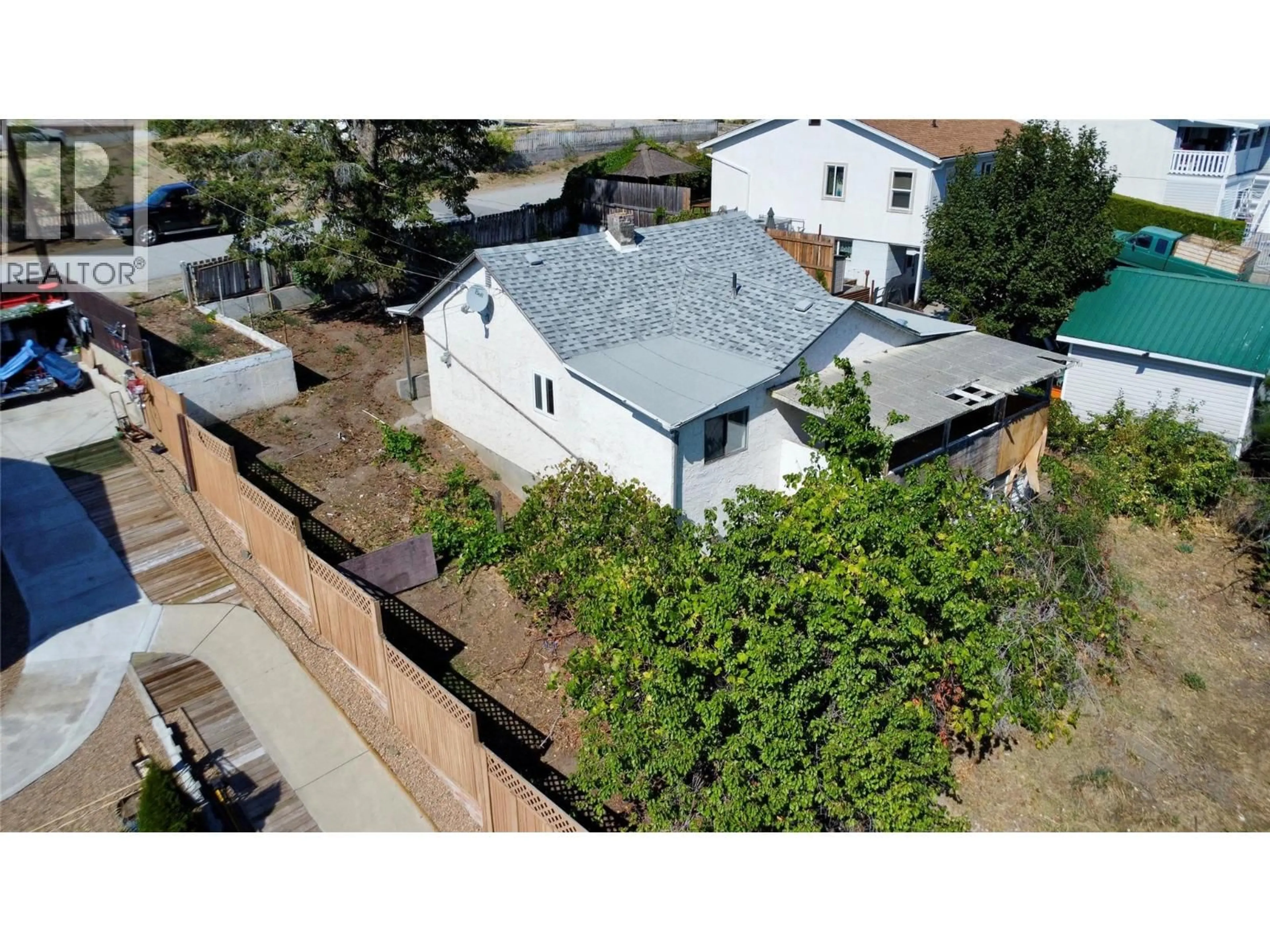 A pic from outside/outdoor area/front of a property/back of a property/a pic from drone, street for 7209 HERON LANE, Osoyoos British Columbia V0H1V0