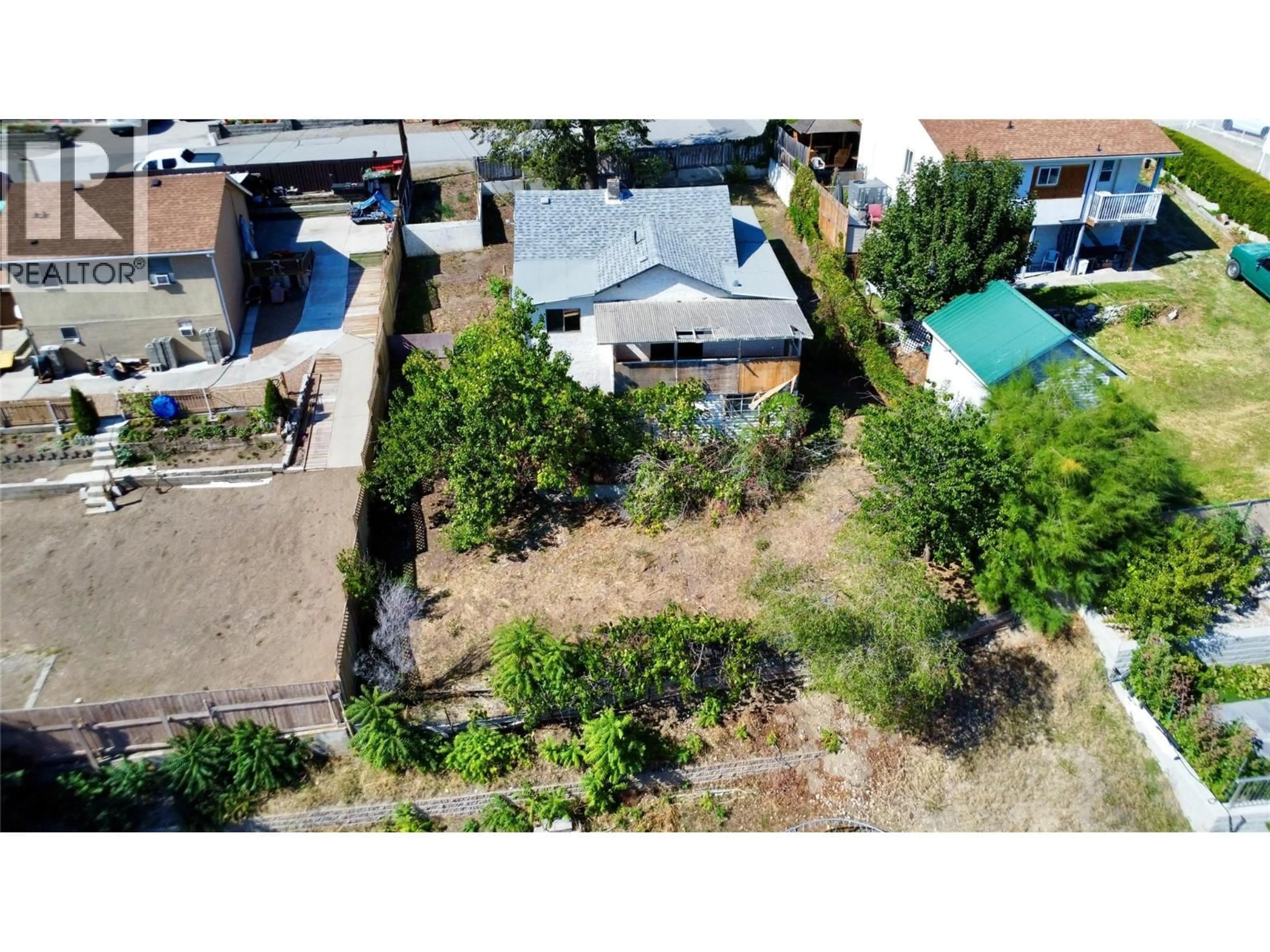 A pic from outside/outdoor area/front of a property/back of a property/a pic from drone, street for 7209 HERON LANE, Osoyoos British Columbia V0H1V0