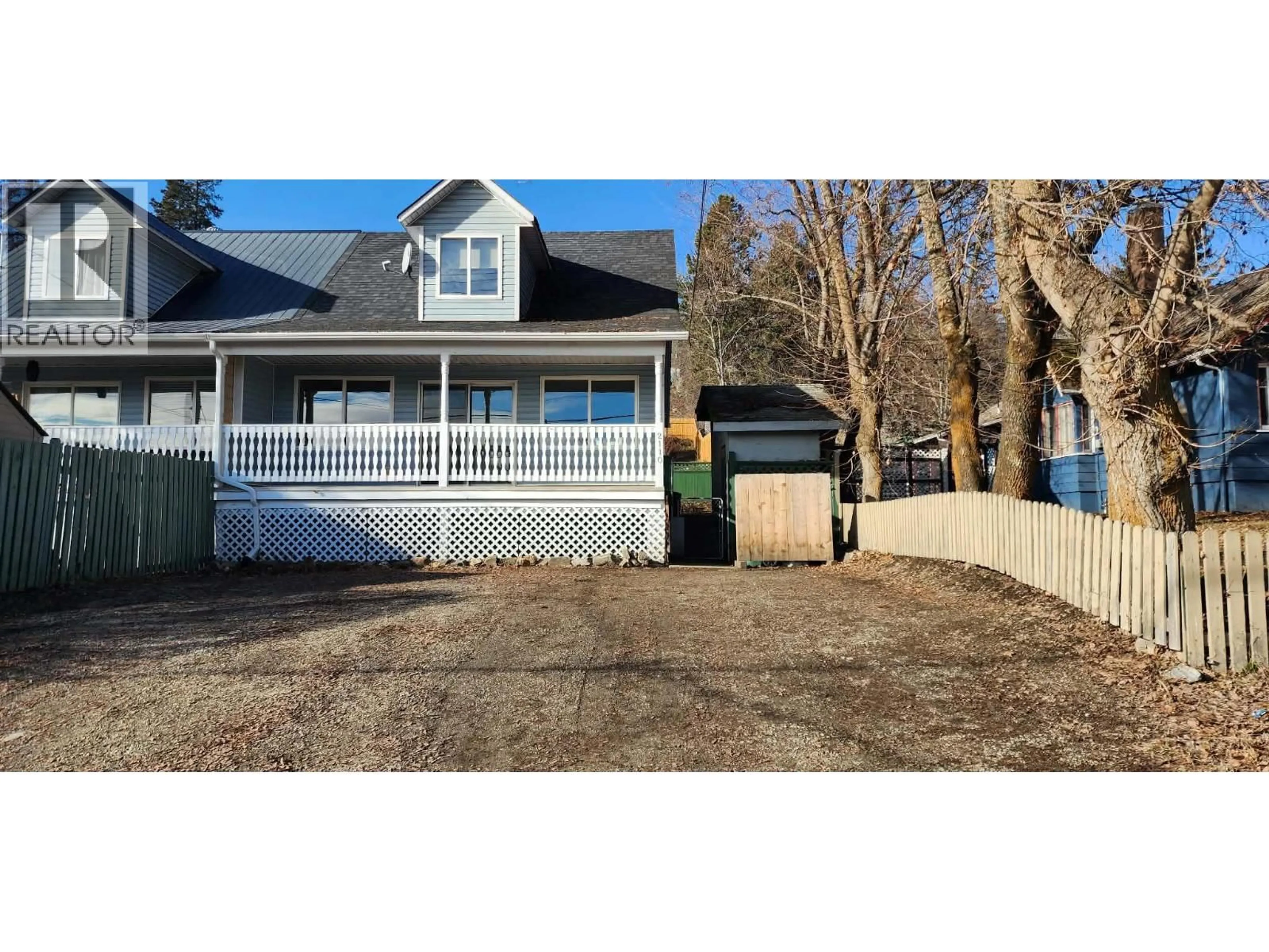 Home with vinyl exterior material, street for 2110 PARK AVENUE, Lumby British Columbia V0E2G0