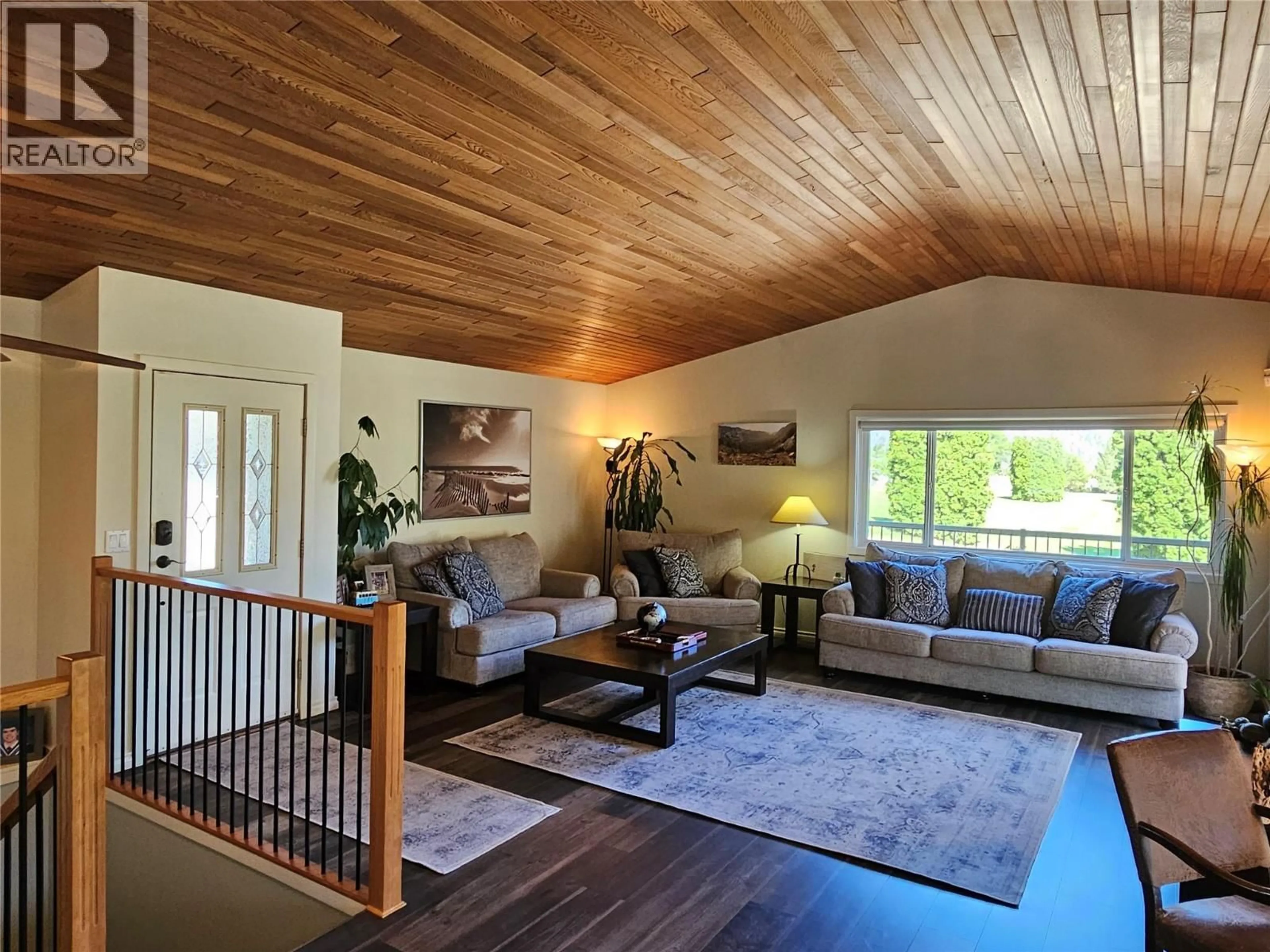 Living room with furniture, wood/laminate floor for 429 3RD AVENUE, Keremeos British Columbia V0X1N2
