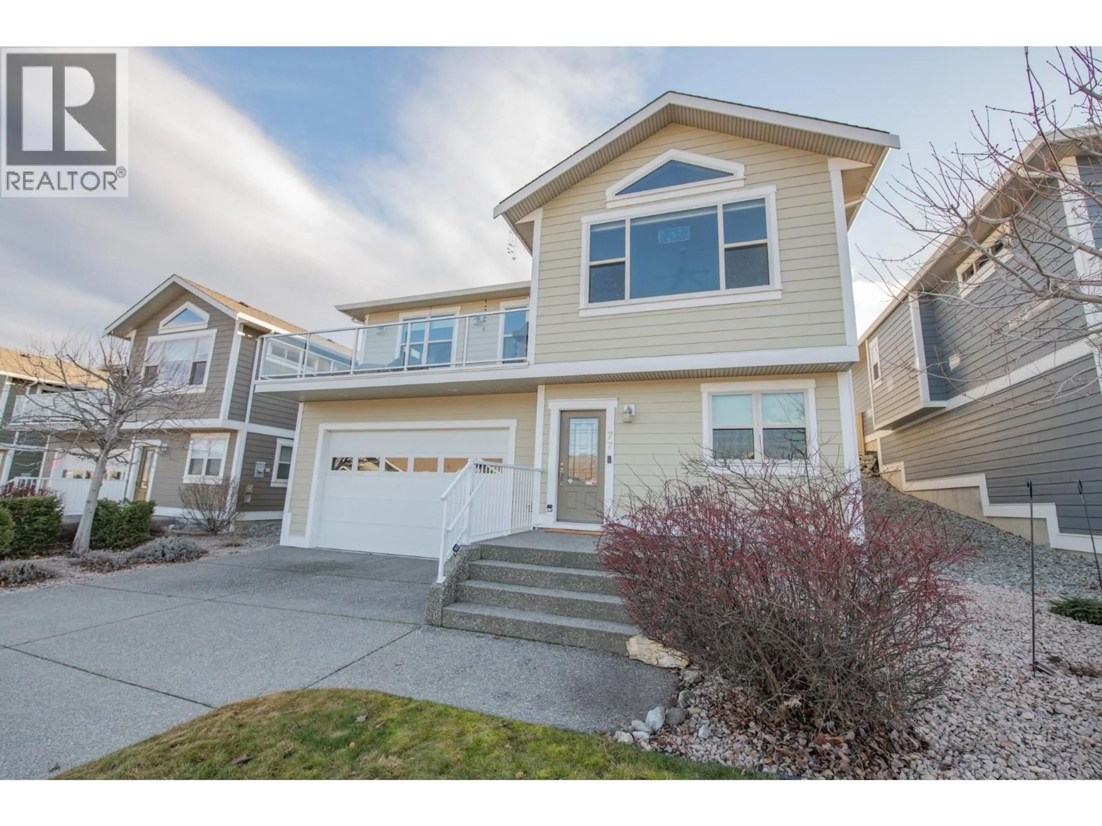 Home with vinyl exterior material, street for 77 - 7760 OKANAGAN LANDING ROAD, Vernon British Columbia V1H1Z4