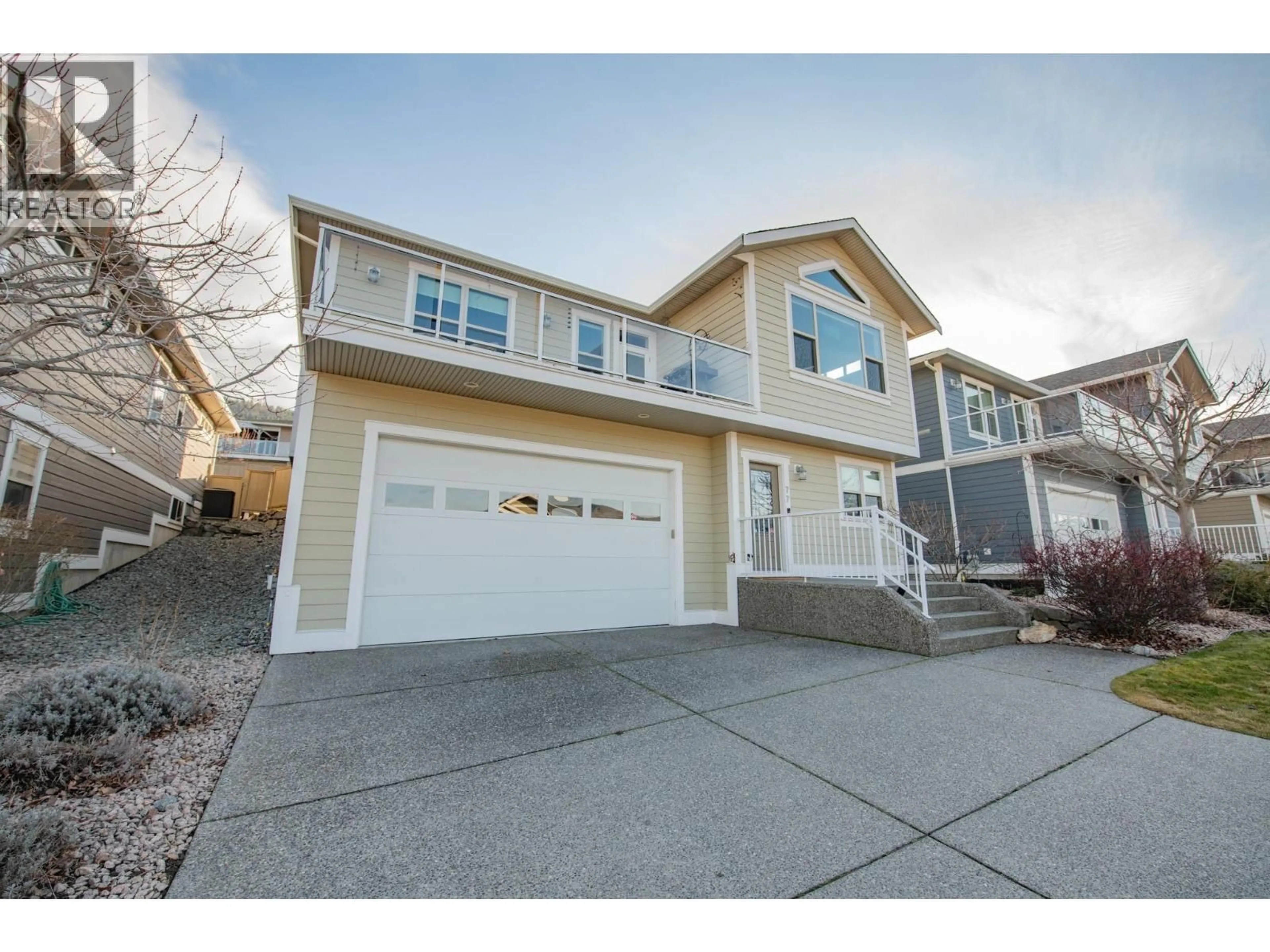 Home with vinyl exterior material, street for 77 - 7760 OKANAGAN LANDING ROAD, Vernon British Columbia V1H1Z4