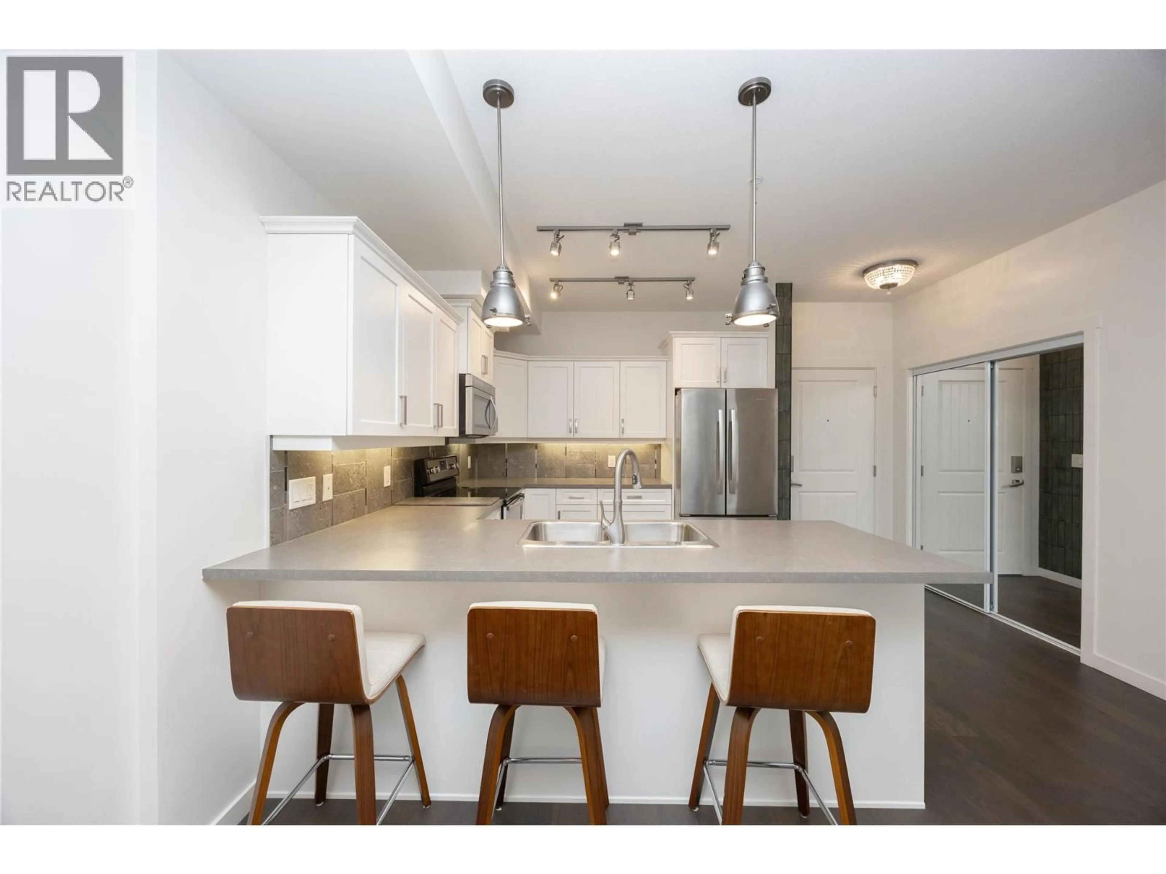 Open concept kitchen, unknown for 103 - 3733 CASORSO ROAD, Kelowna British Columbia V1W5E3