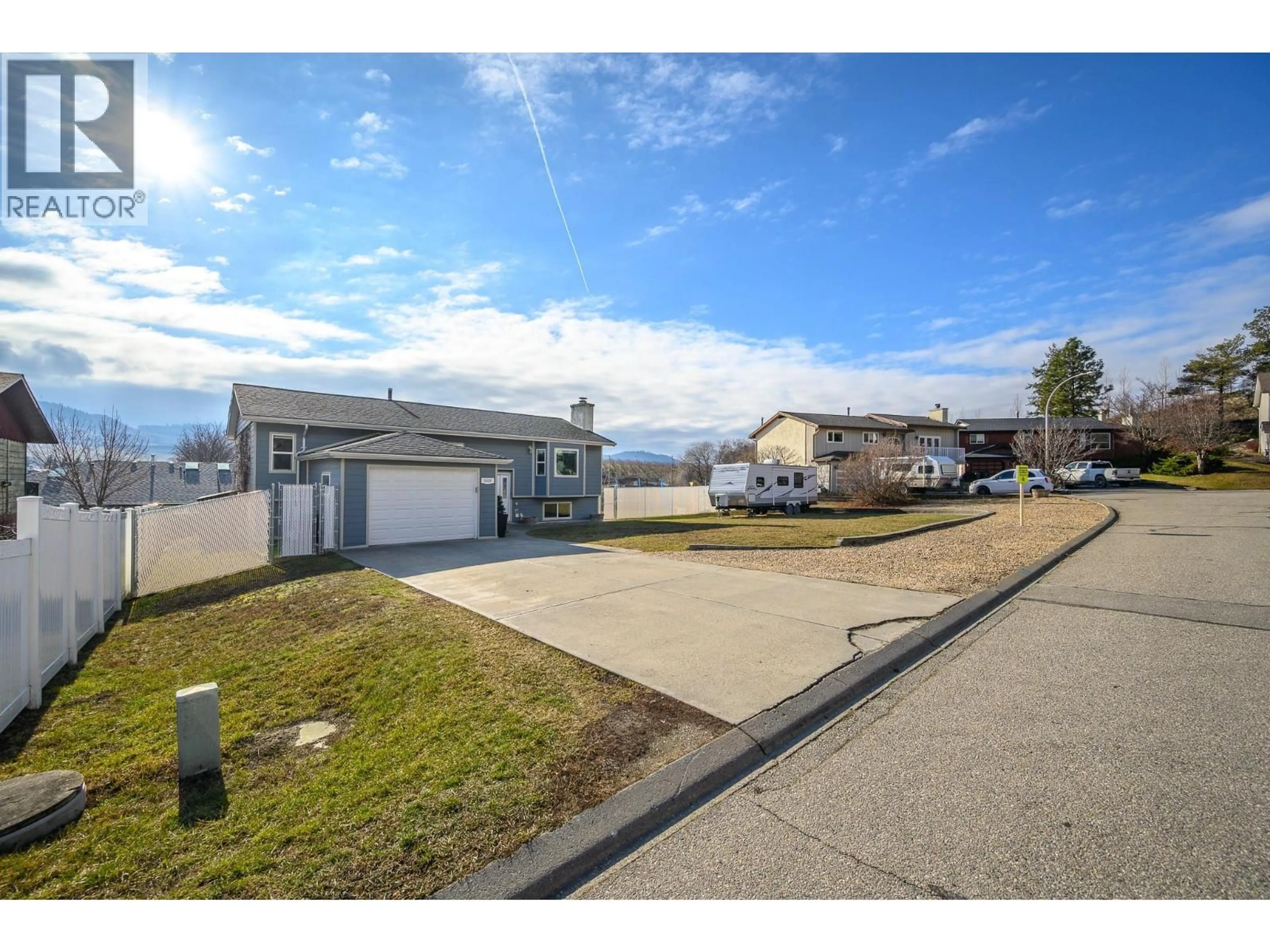 A pic from outside/outdoor area/front of a property/back of a property/a pic from drone, street for 5608 ALLENBY CRESCENT, Vernon British Columbia V1T8P8