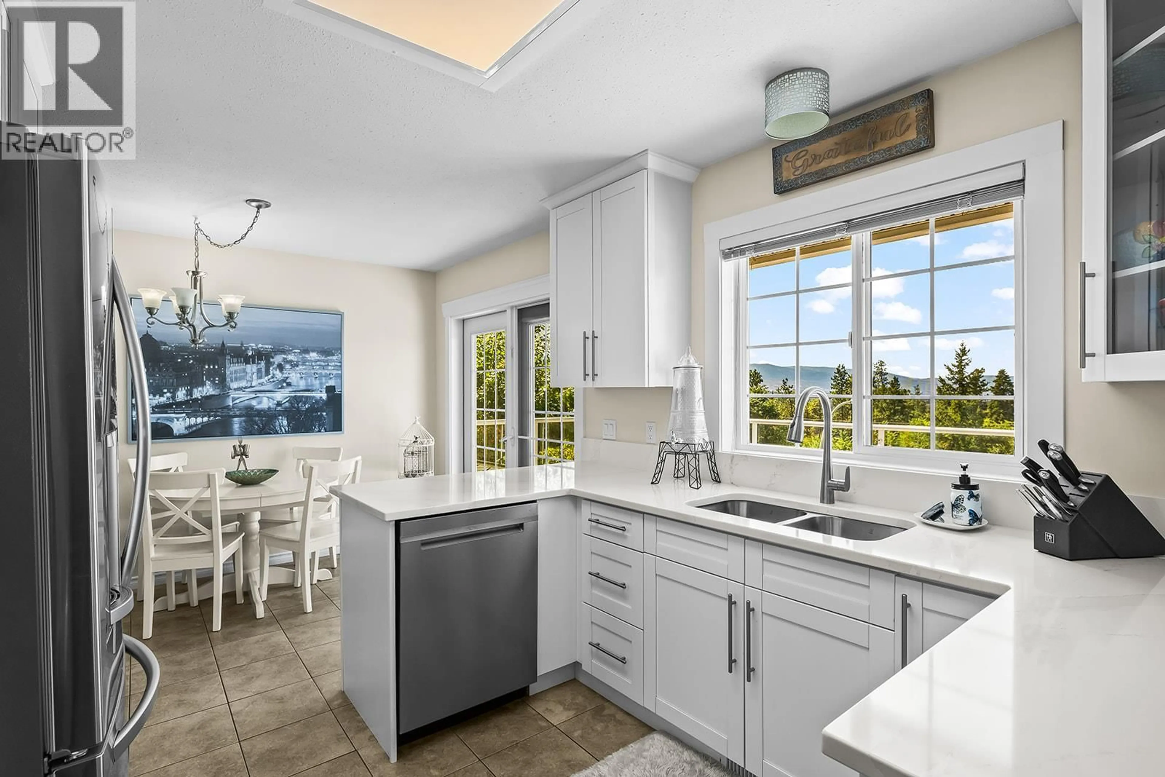 Open concept kitchen, ceramic/tile floor for 1337 BENTIEN ROAD, Kelowna British Columbia V1X7K3