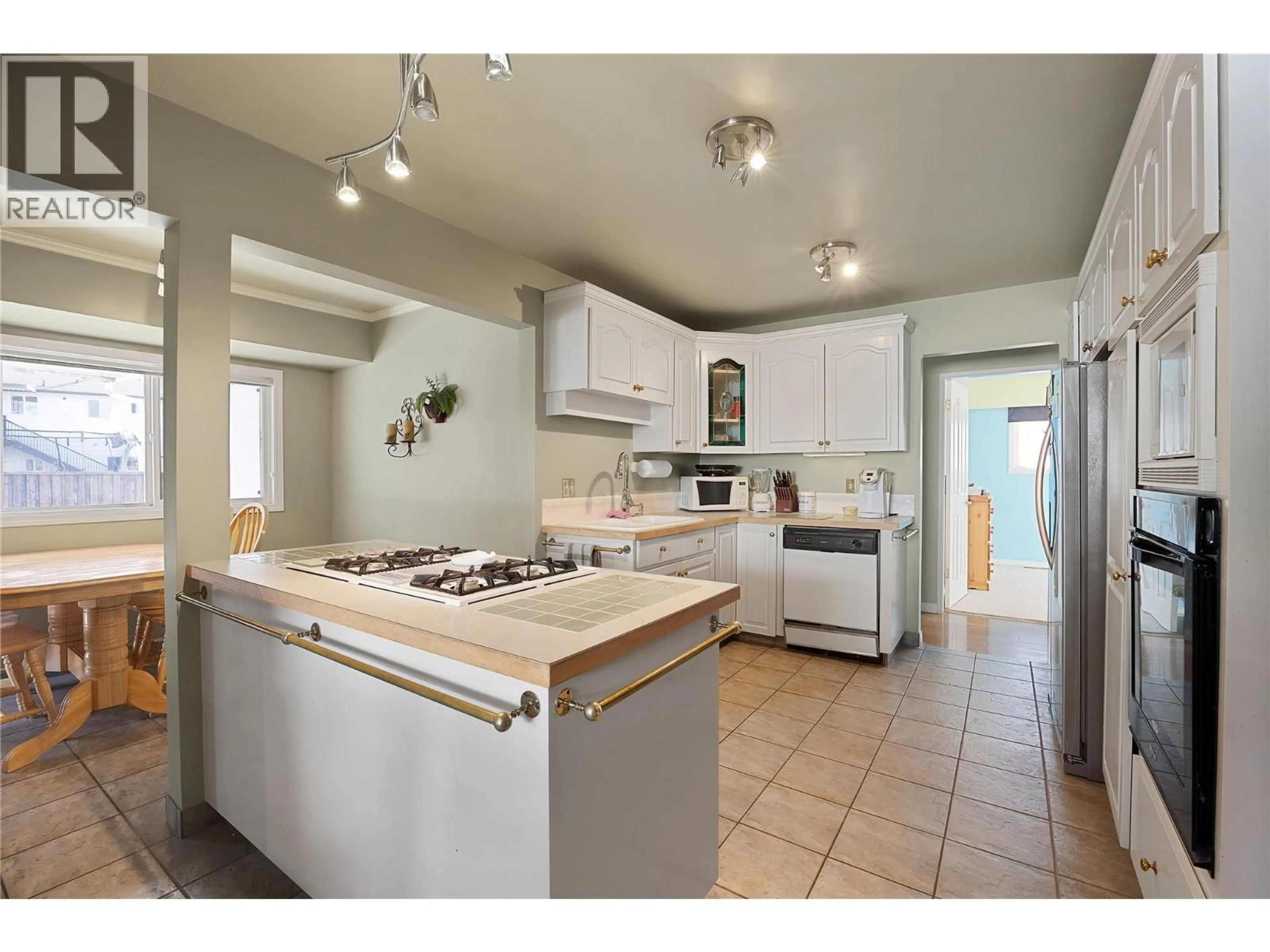 Open concept kitchen, ceramic/tile floor for 187 BRACEWELL DRIVE, Penticton British Columbia V2A6X1