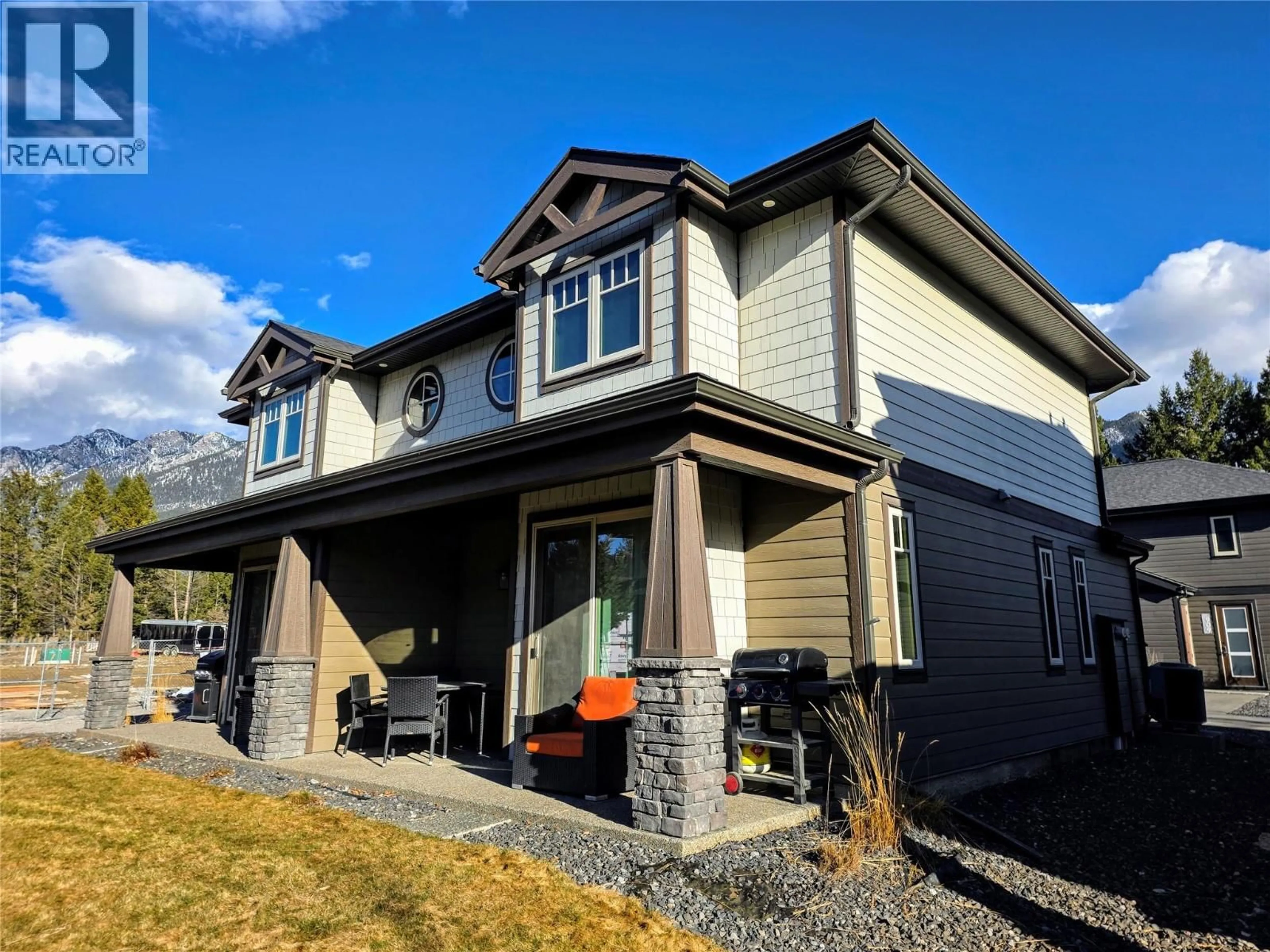 Home with vinyl exterior material, street for 919 - 900 BIGHORN BOULEVARD, Radium Hot Springs British Columbia V0A1M0