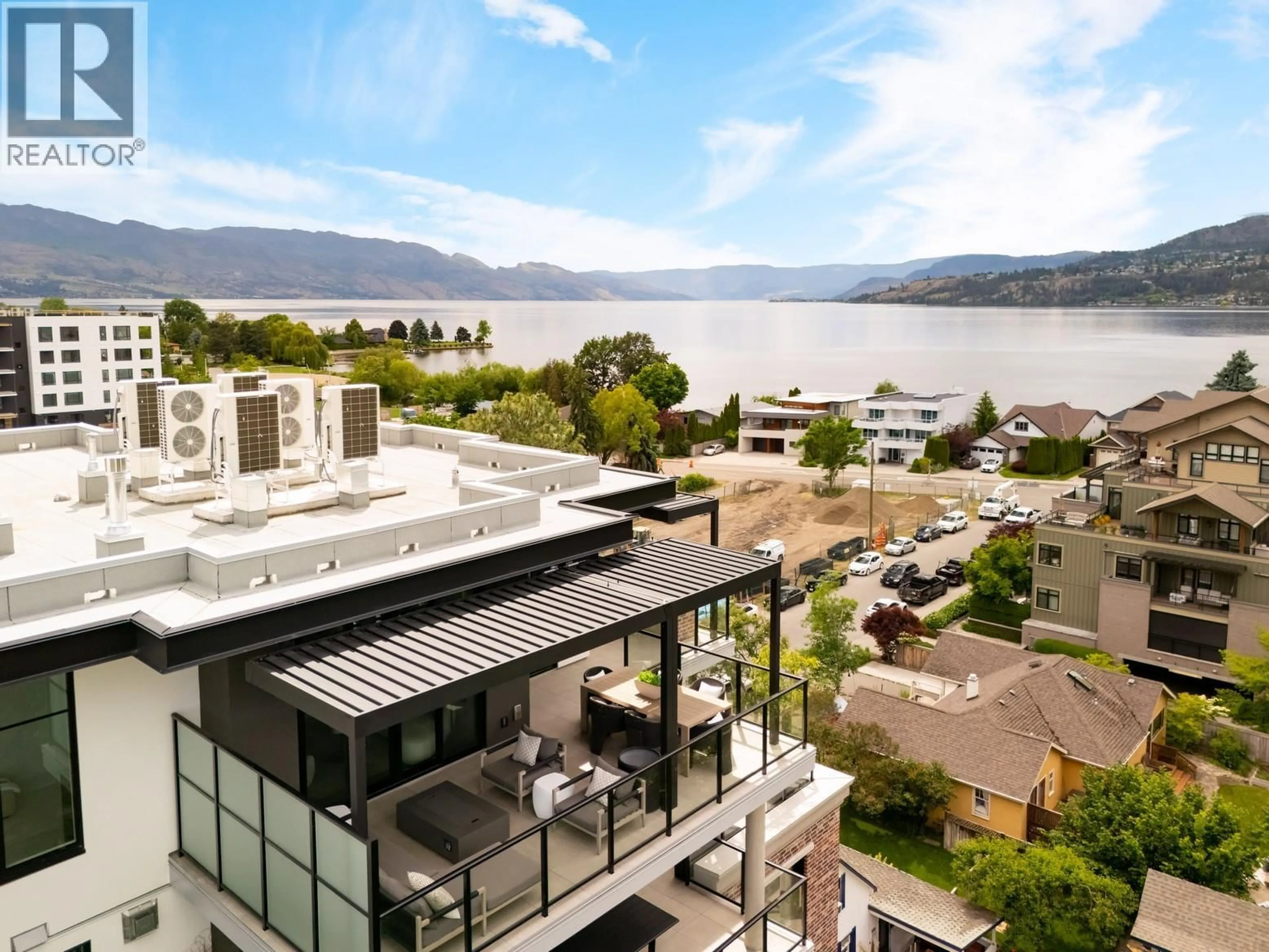 A pic from outside/outdoor area/front of a property/back of a property/a pic from drone, water/lake/river/ocean view for 601 - 460 GROVES AVENUE, Kelowna British Columbia V1Y4Y5