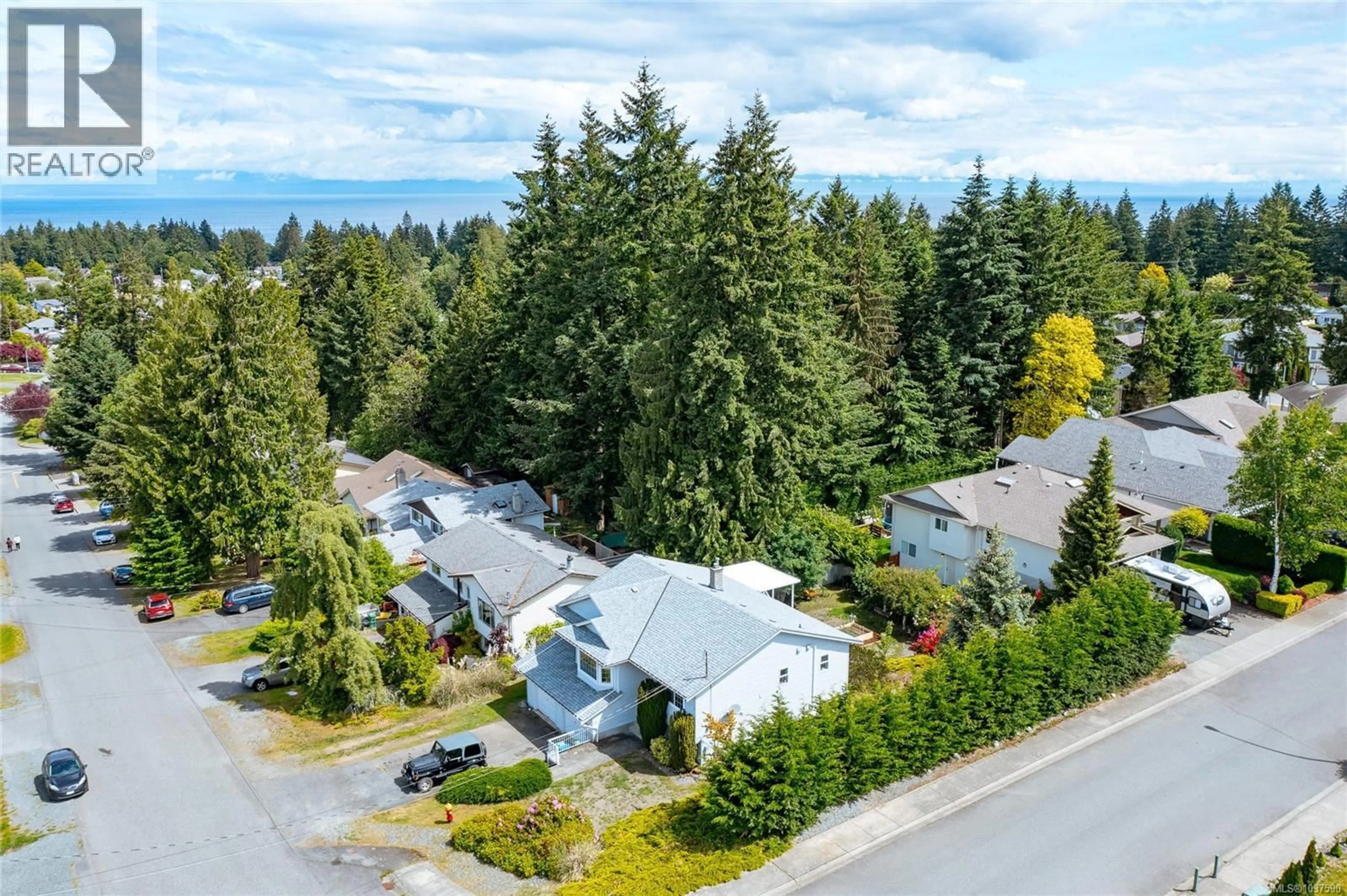 A pic from outside/outdoor area/front of a property/back of a property/a pic from drone, mountain view for 5536 VENTURA DRIVE, Nanaimo British Columbia V9T5M6