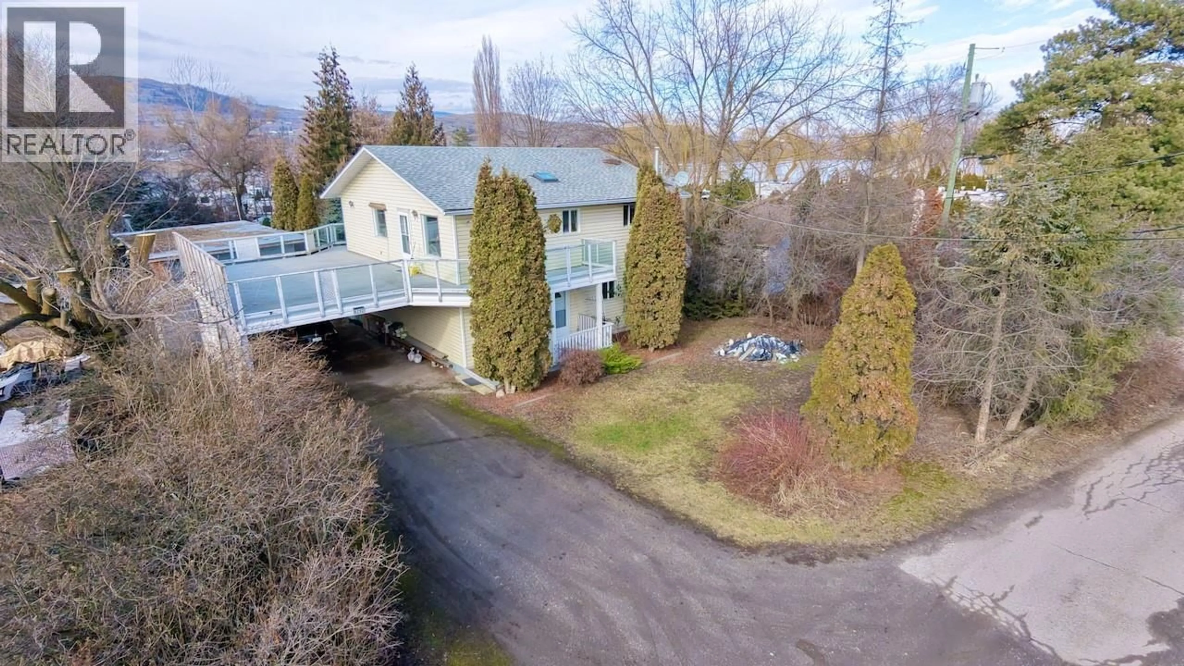 A pic from outside/outdoor area/front of a property/back of a property/a pic from drone, water/lake/river/ocean view for 6292 STICKLE ROAD, Vernon British Columbia V1B3R2