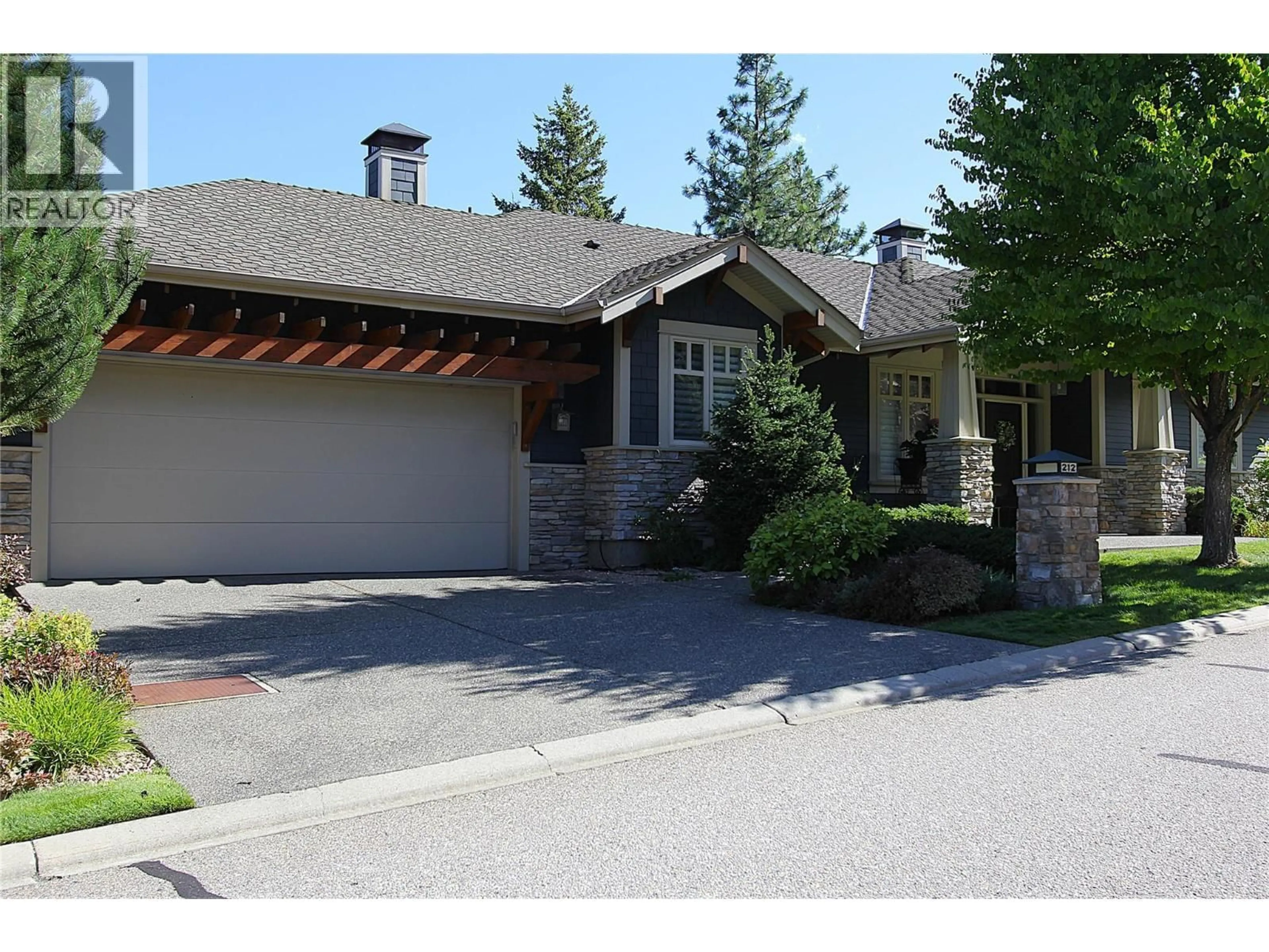 Home with brick exterior material, street for 212 CHICOPEE ROAD, Vernon British Columbia V1H1V5