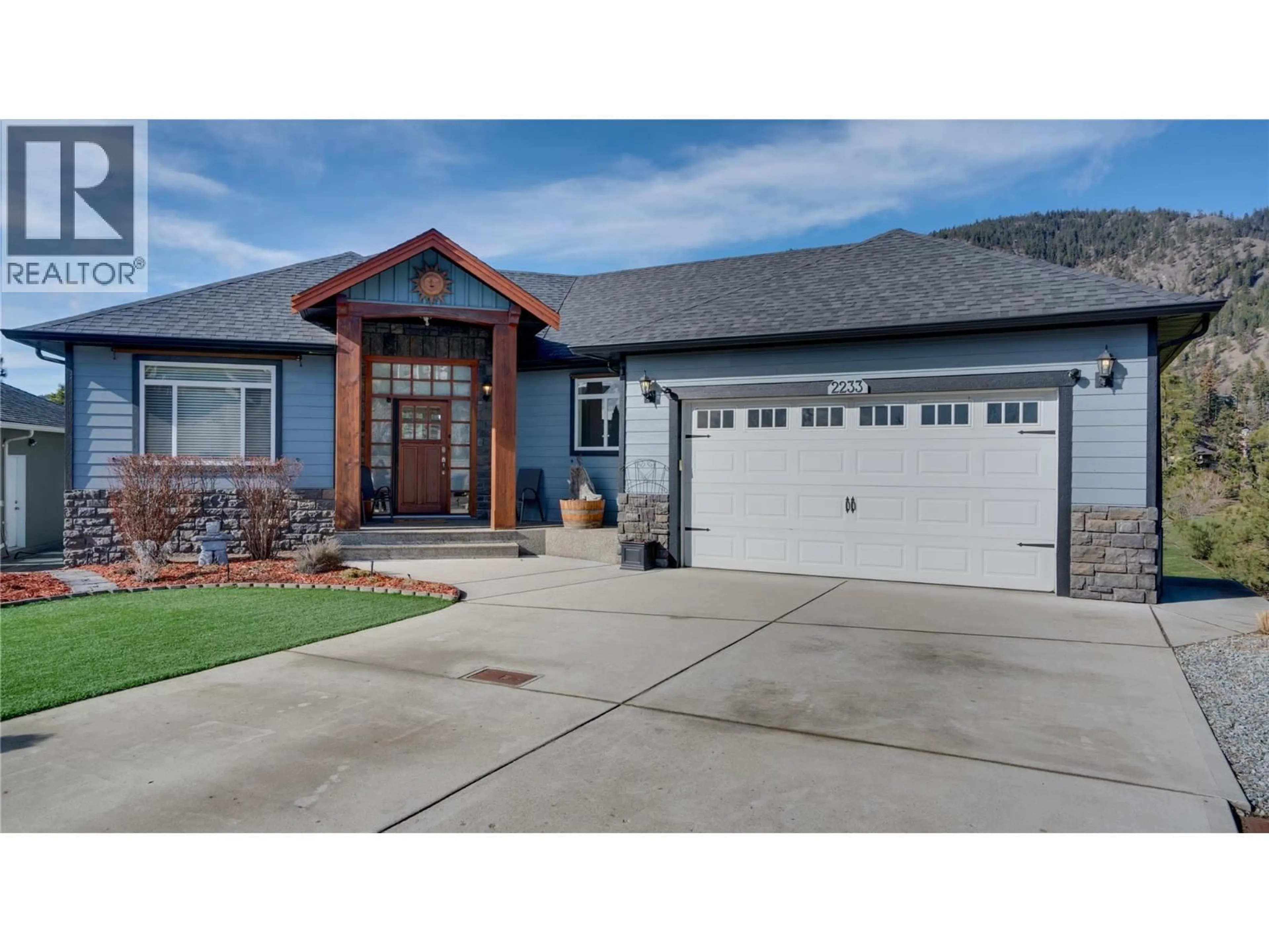 Home with vinyl exterior material, street for 2233 HELGASON DRIVE, Westbank British Columbia V4T2W9