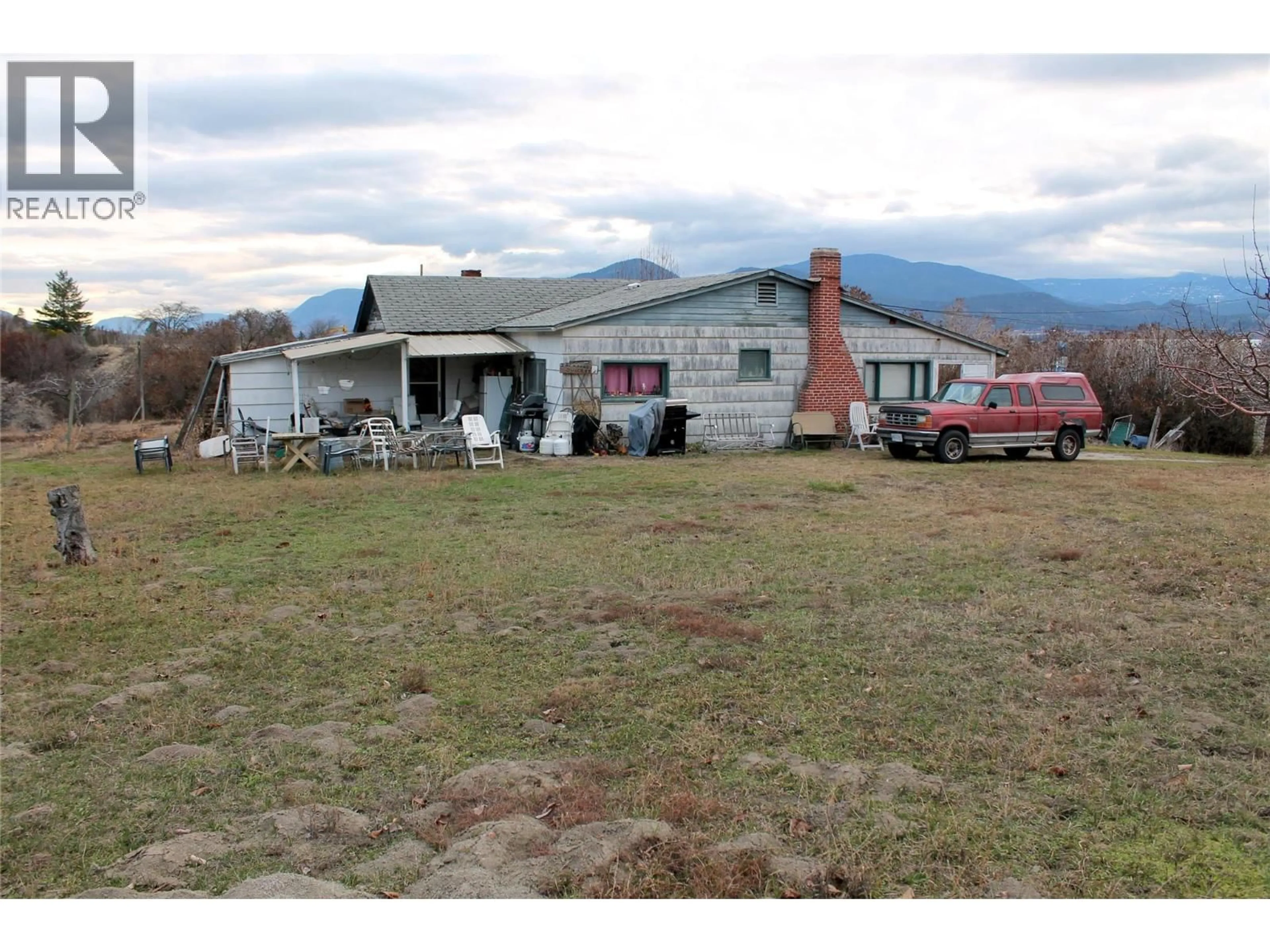 A pic from outside/outdoor area/front of a property/back of a property/a pic from drone, mountain view for 910 BOOTHE ROAD, Naramata British Columbia V0H1N1
