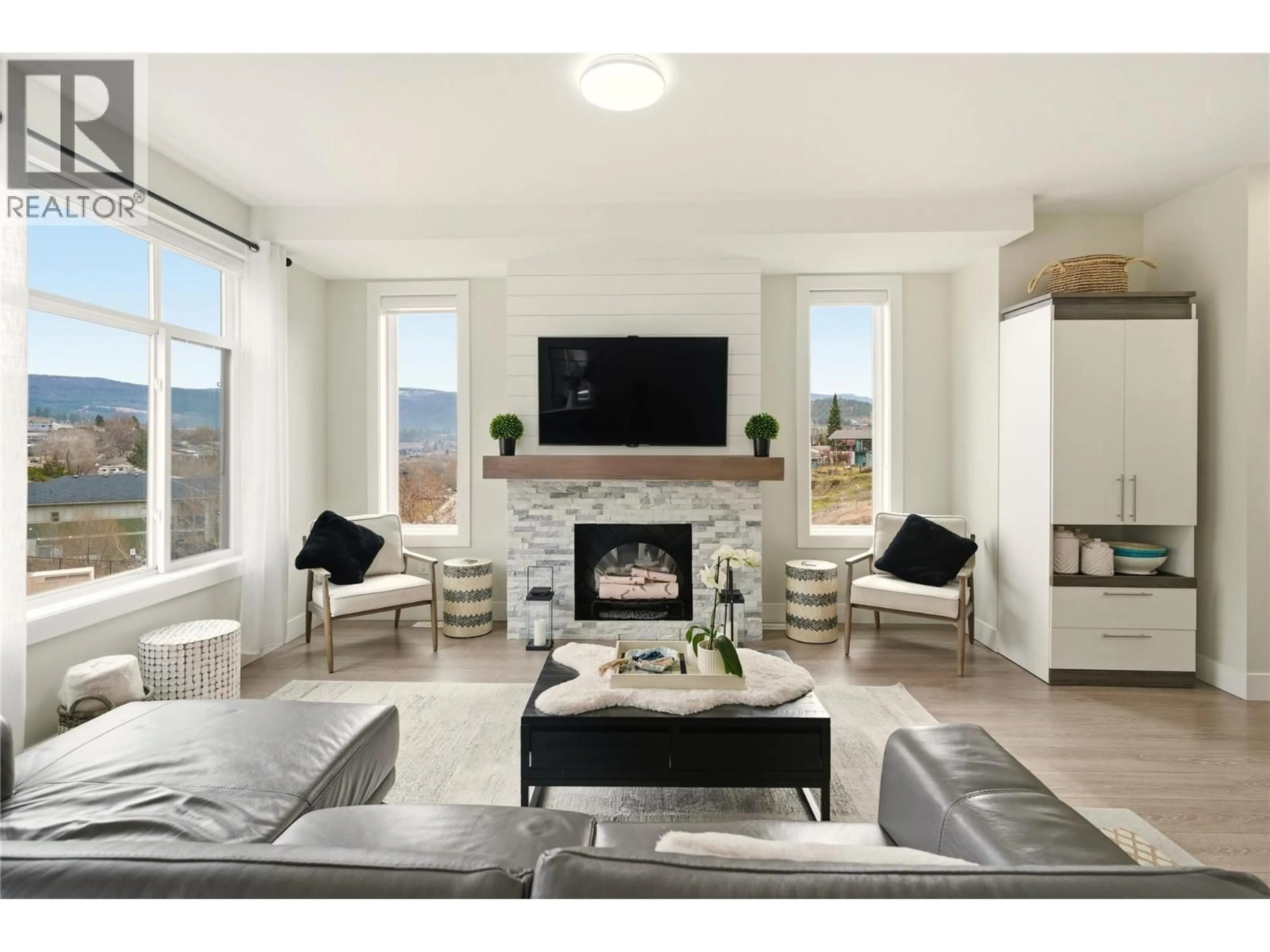 Living room with furniture, ceramic/tile floor for 1176 BLACK MOUNTAIN DRIVE, Kelowna British Columbia V1P0A7