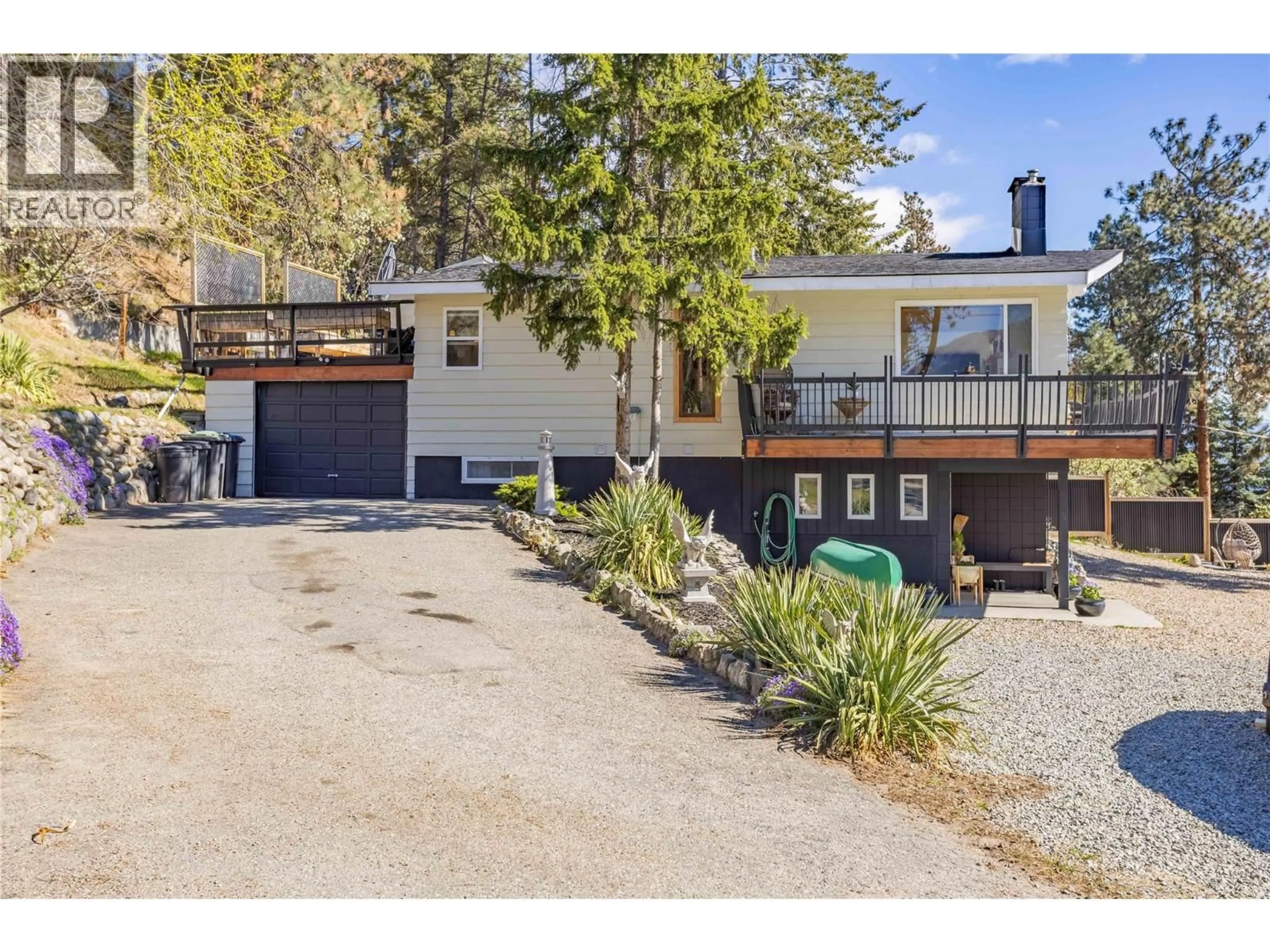 A pic from outside/outdoor area/front of a property/back of a property/a pic from drone, street for 3991 DESERT PINES AVENUE, Peachland British Columbia V0H1X2