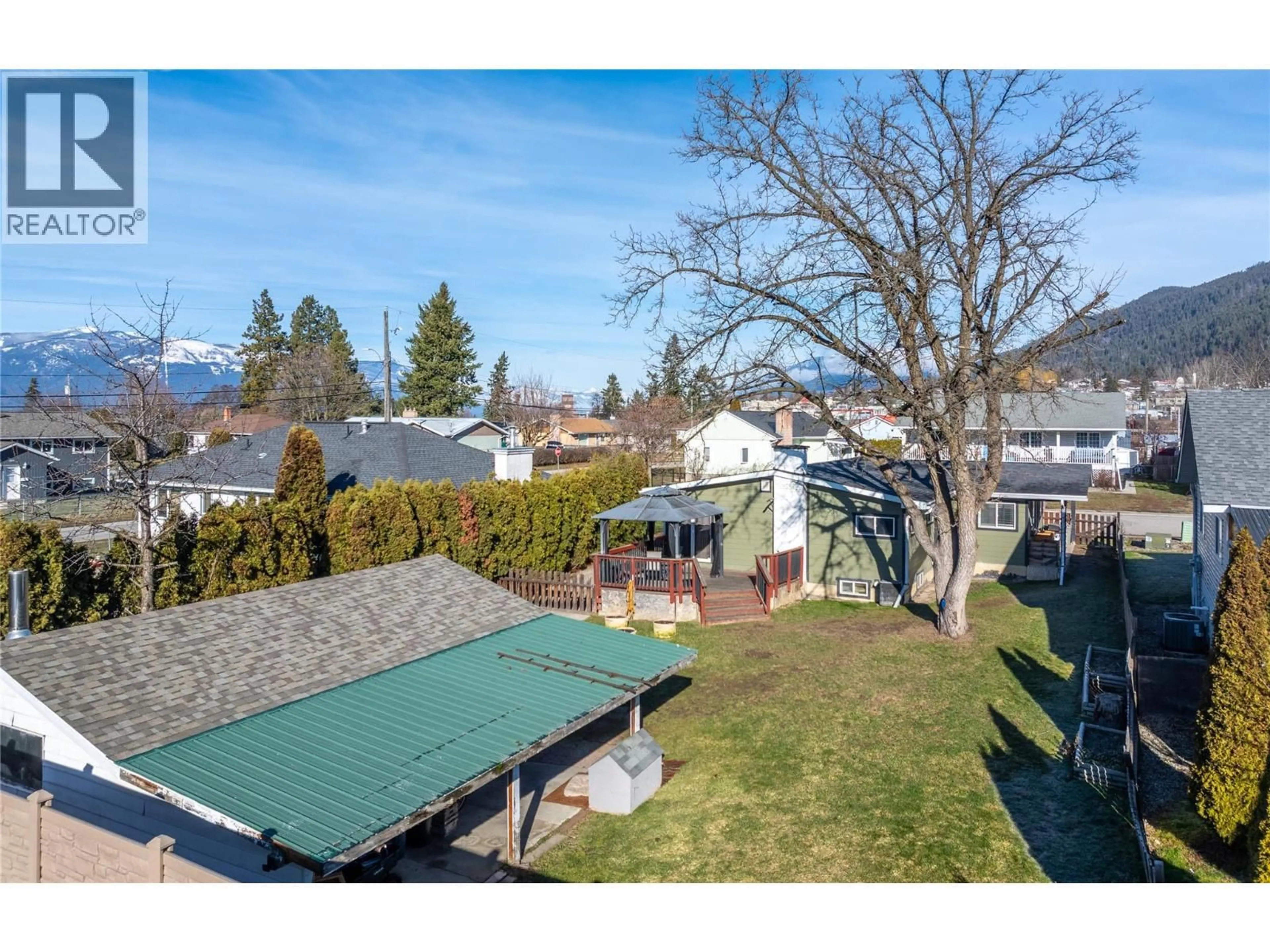 A pic from outside/outdoor area/front of a property/back of a property/a pic from drone, mountain view for 1407 BIRCH STREET, Creston British Columbia V0B1G3