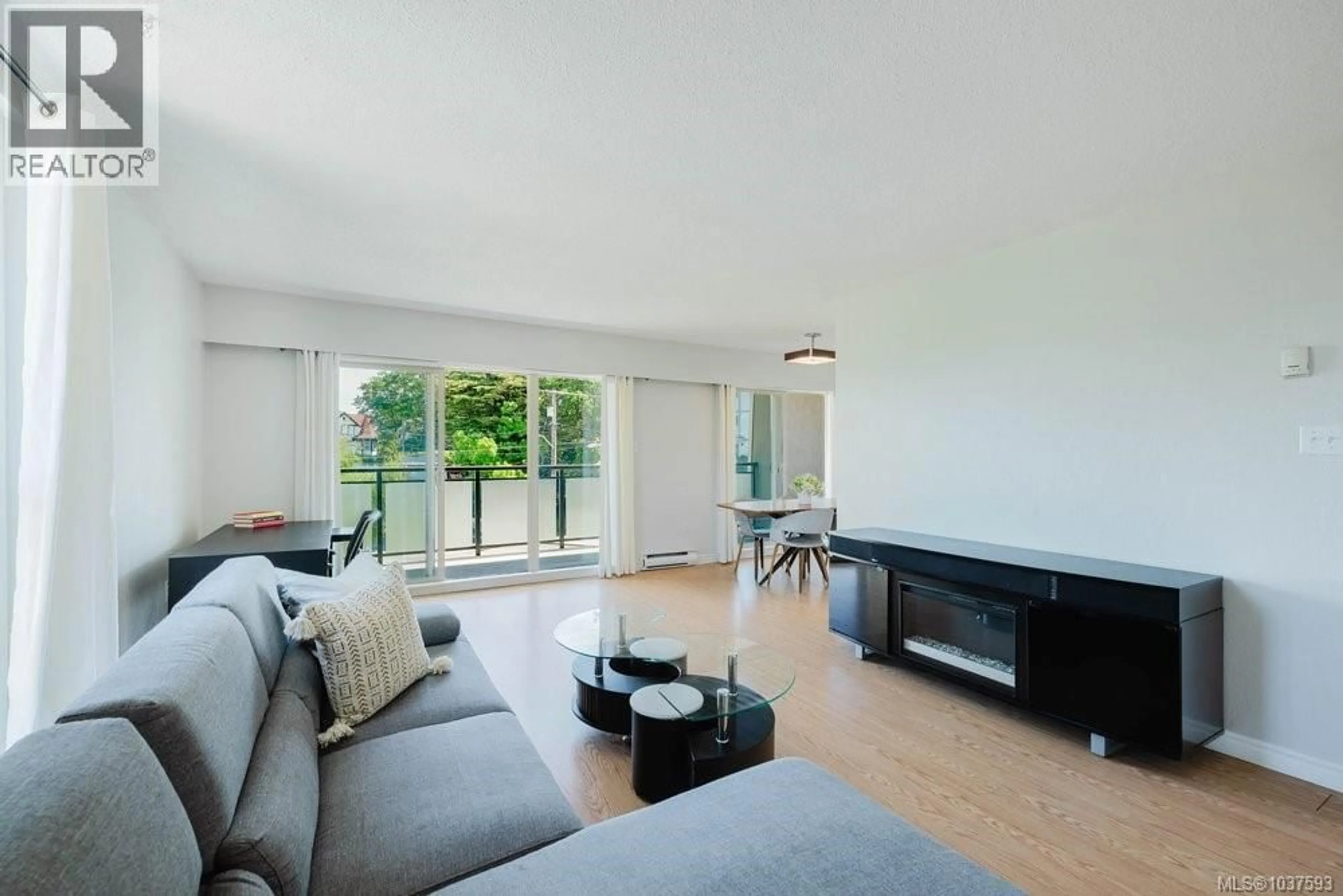Living room with furniture, unknown for 306 - 1545 PANDORA AVENUE, Victoria British Columbia V8R6R1