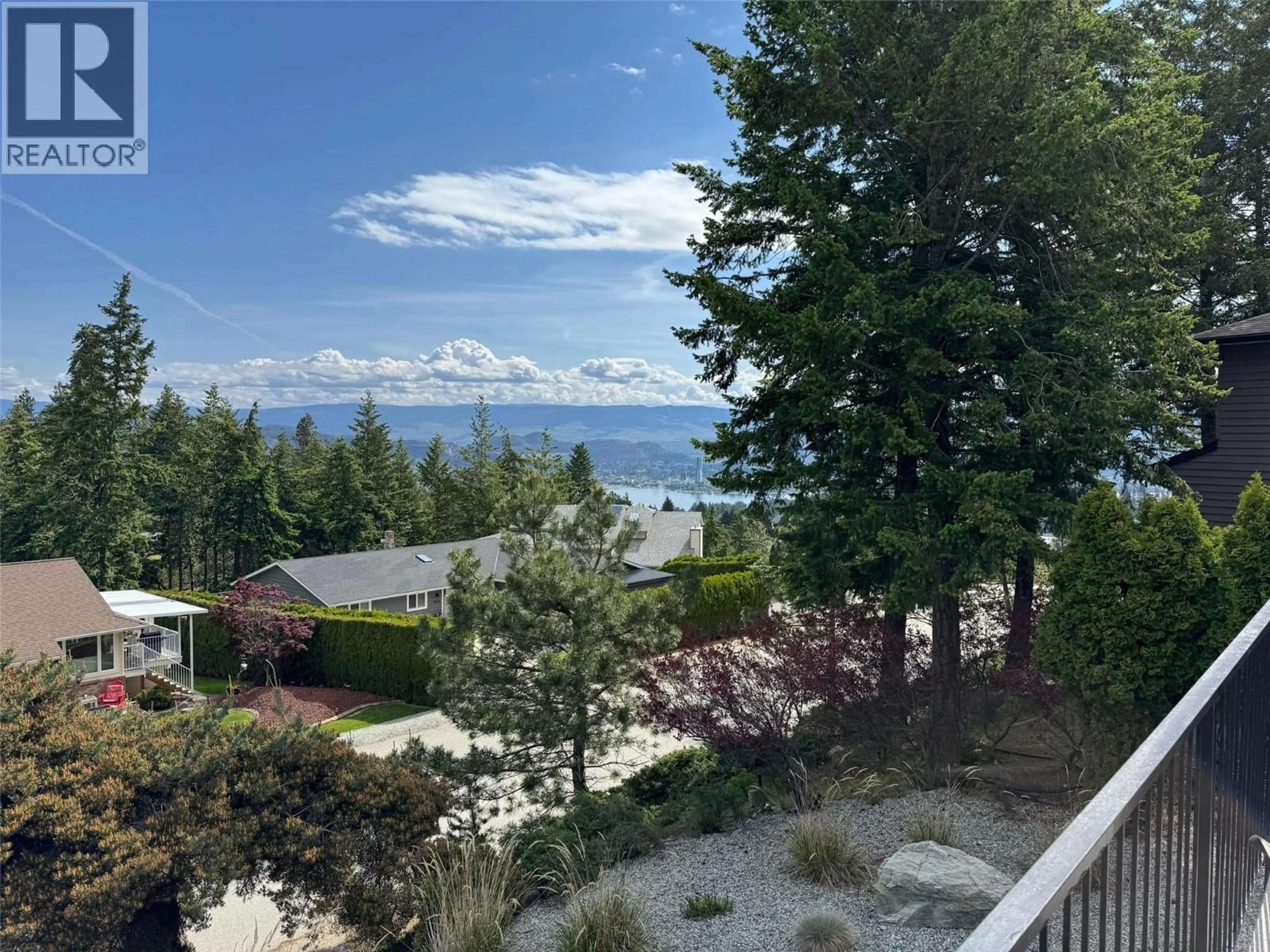 A pic from outside/outdoor area/front of a property/back of a property/a pic from drone, water/lake/river/ocean view for 1820 OLYMPUS WAY, West Kelowna British Columbia V1Z3J1