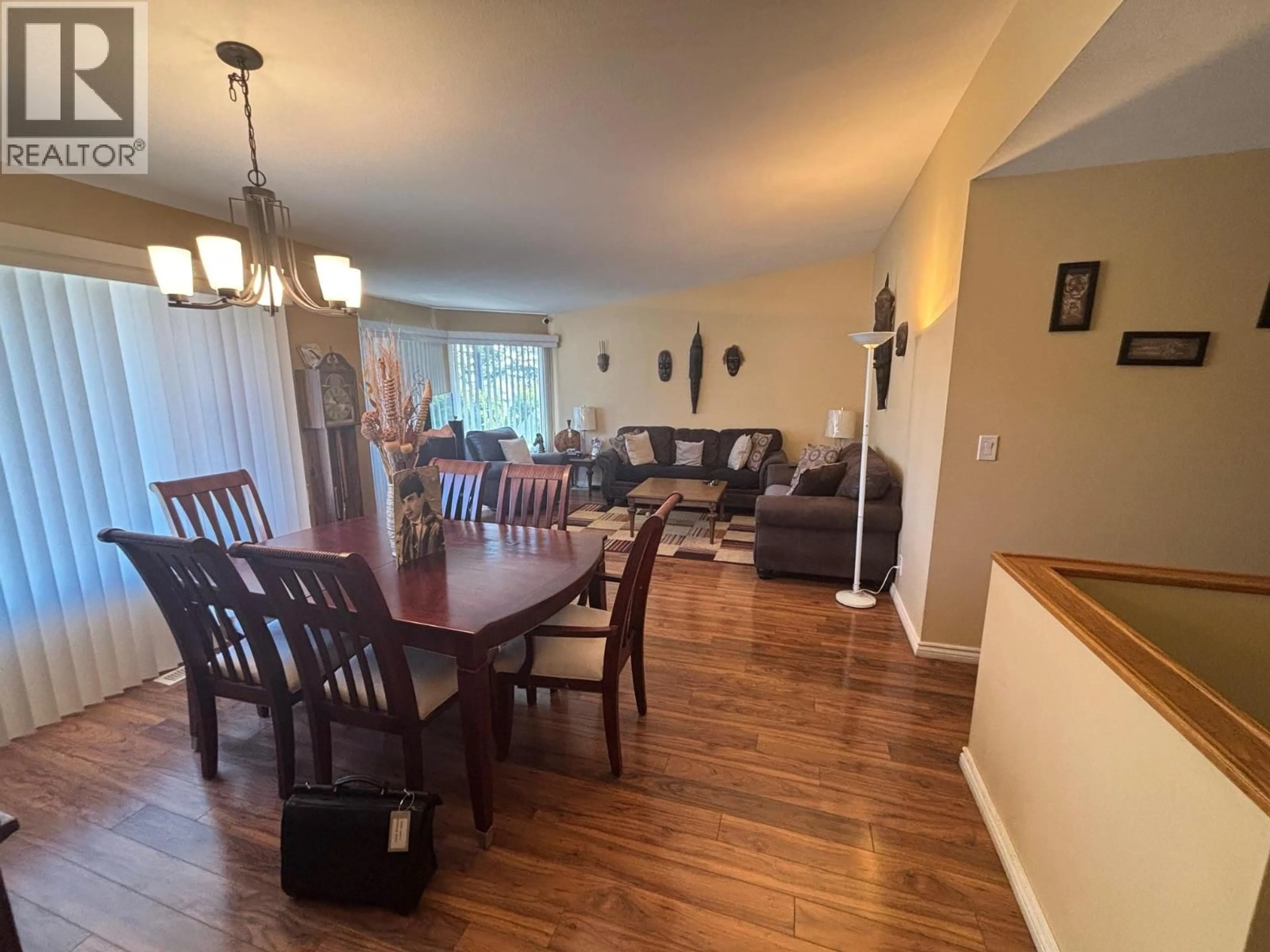 Dining room, wood/laminate floor for 1820 OLYMPUS WAY, West Kelowna British Columbia V1Z3J1