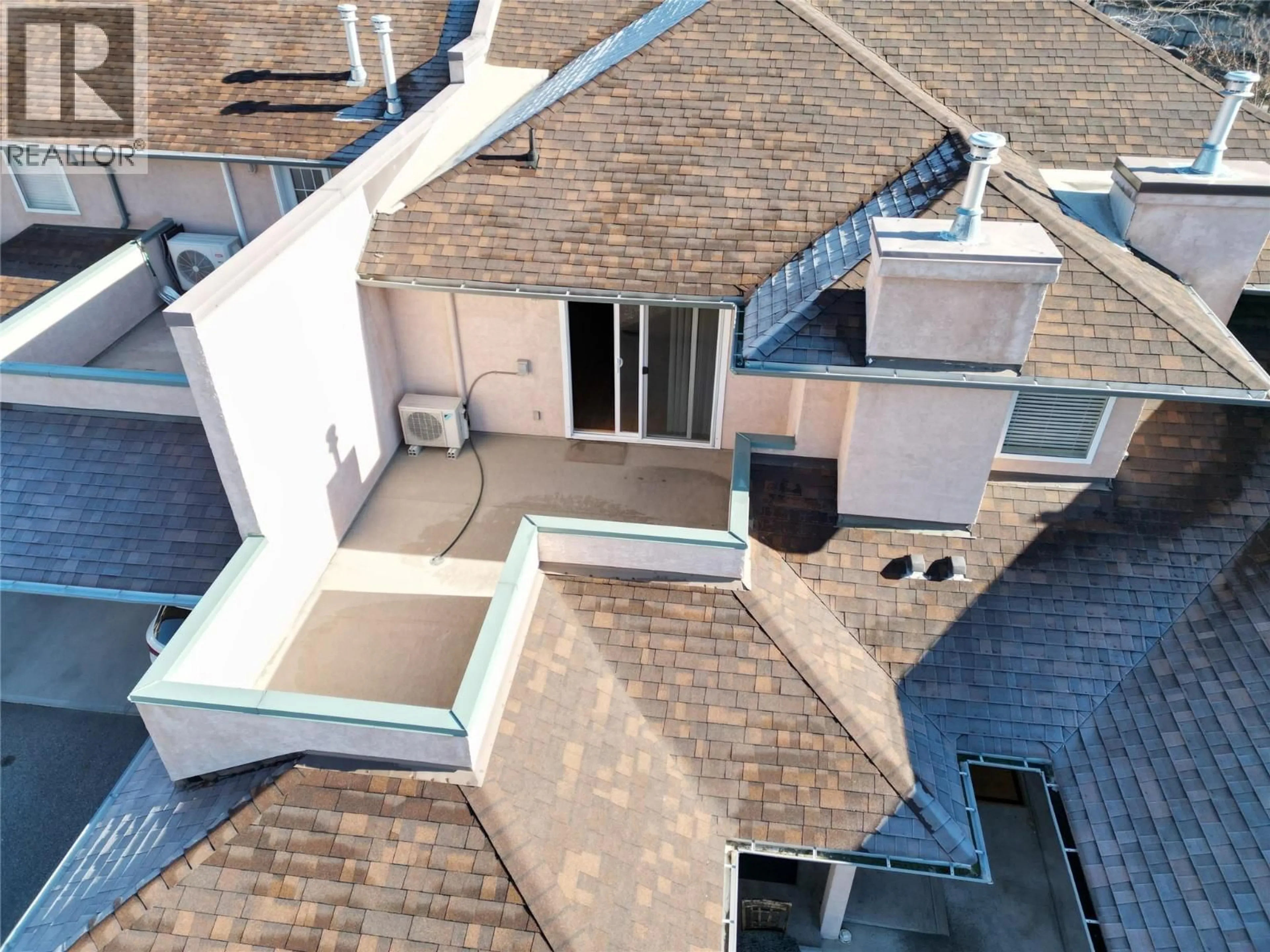 A pic from outside/outdoor area/front of a property/back of a property/a pic from drone, city buildings view from balcony for 19 - 6514 MEADOWS DRIVE, Oliver British Columbia V0H1T3