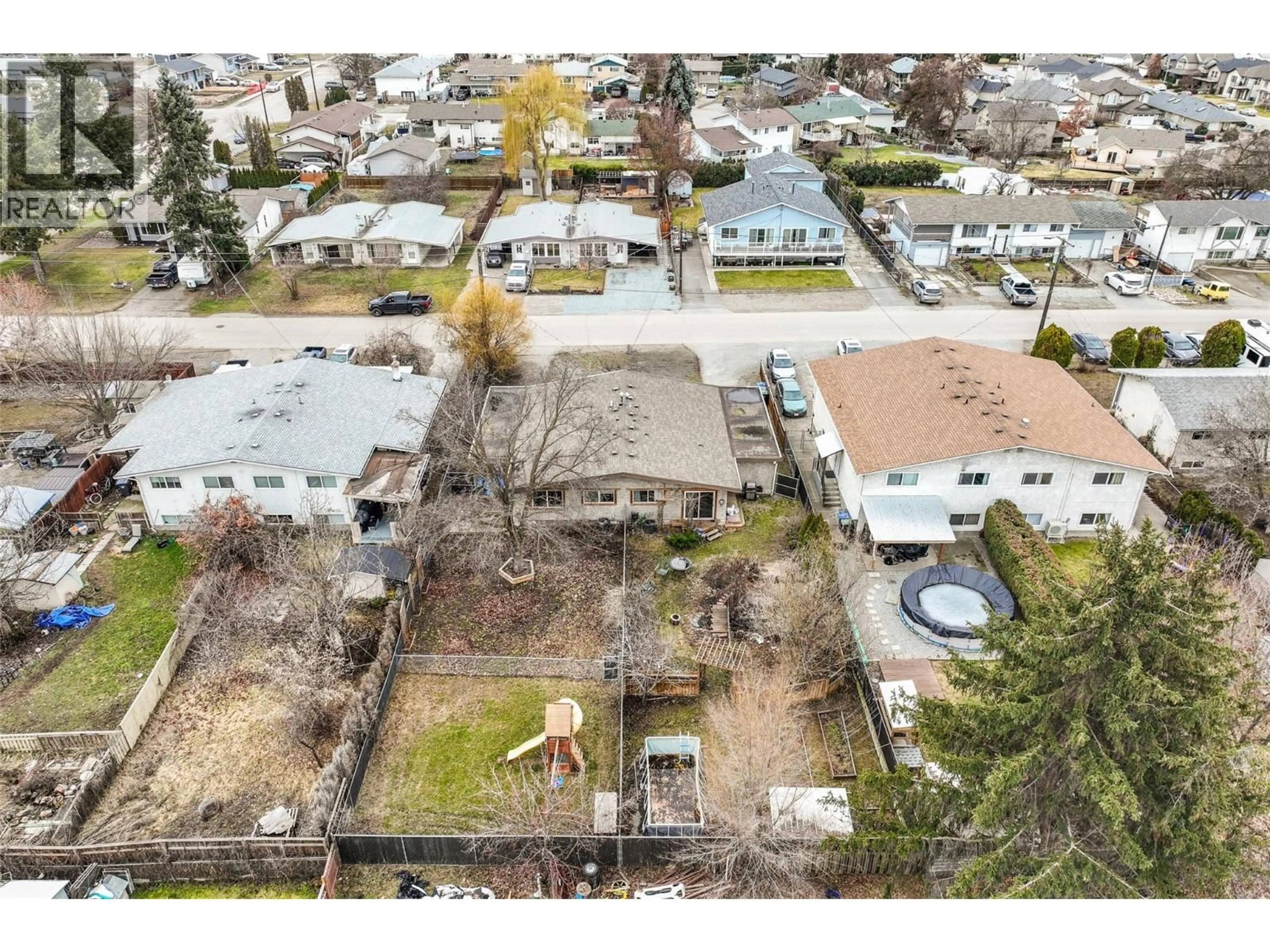 A pic from outside/outdoor area/front of a property/back of a property/a pic from drone, street for 458-460 KEITHLEY ROAD, Kelowna British Columbia V1X2N7
