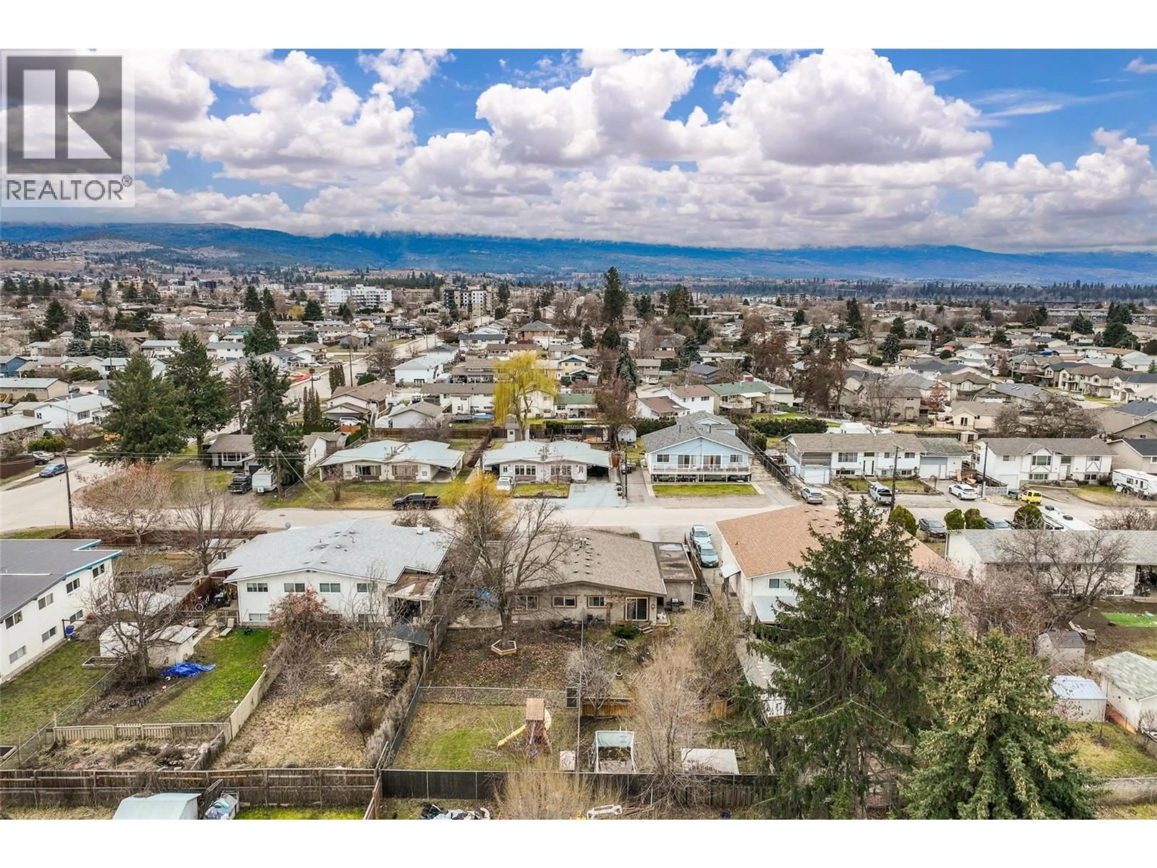 A pic from outside/outdoor area/front of a property/back of a property/a pic from drone, mountain view for 458-460 KEITHLEY ROAD, Kelowna British Columbia V1X2N7