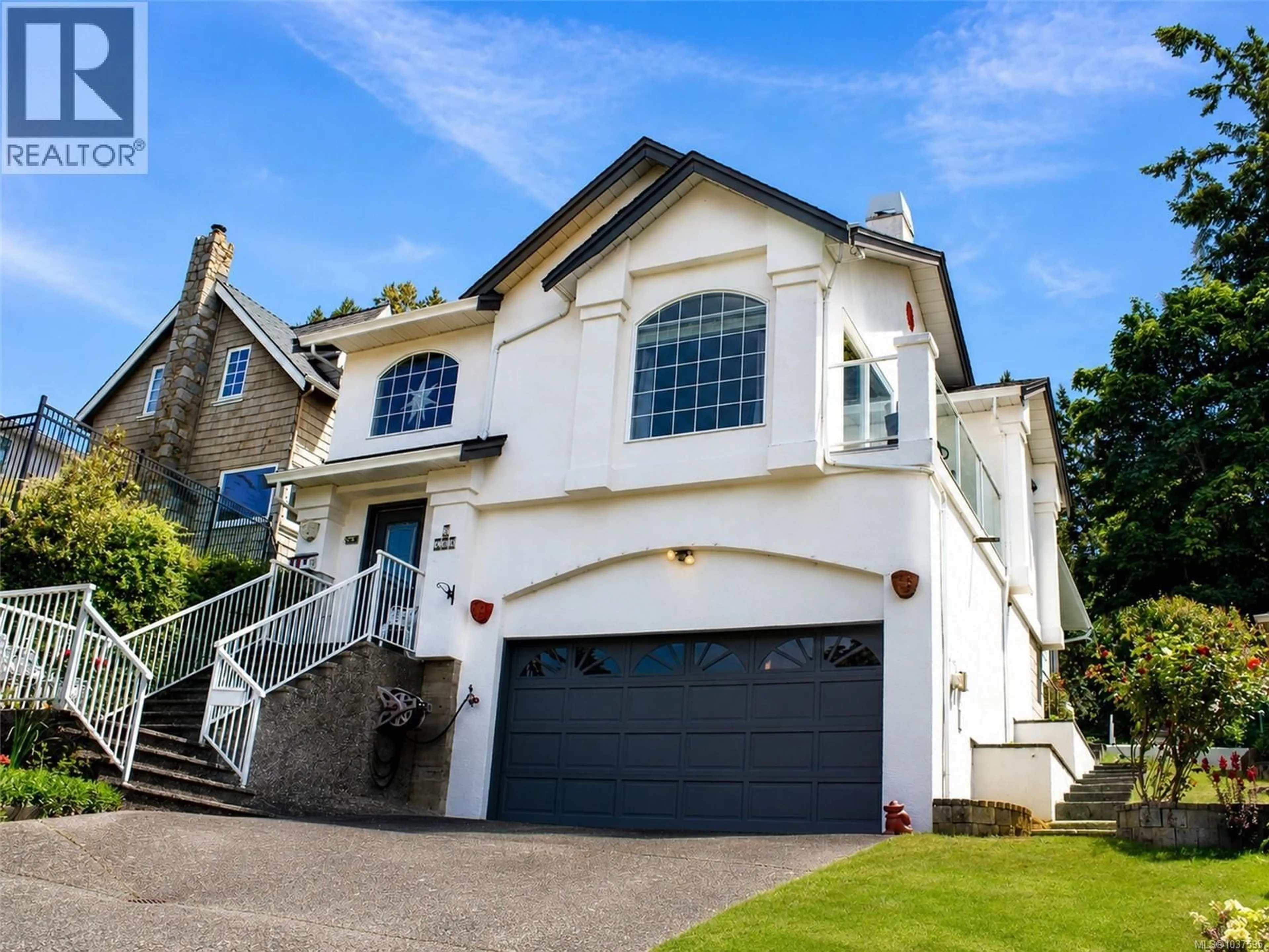 Home with vinyl exterior material, street for 2 - 709 LUSCOMBE PLACE, Esquimalt British Columbia V9A7L6