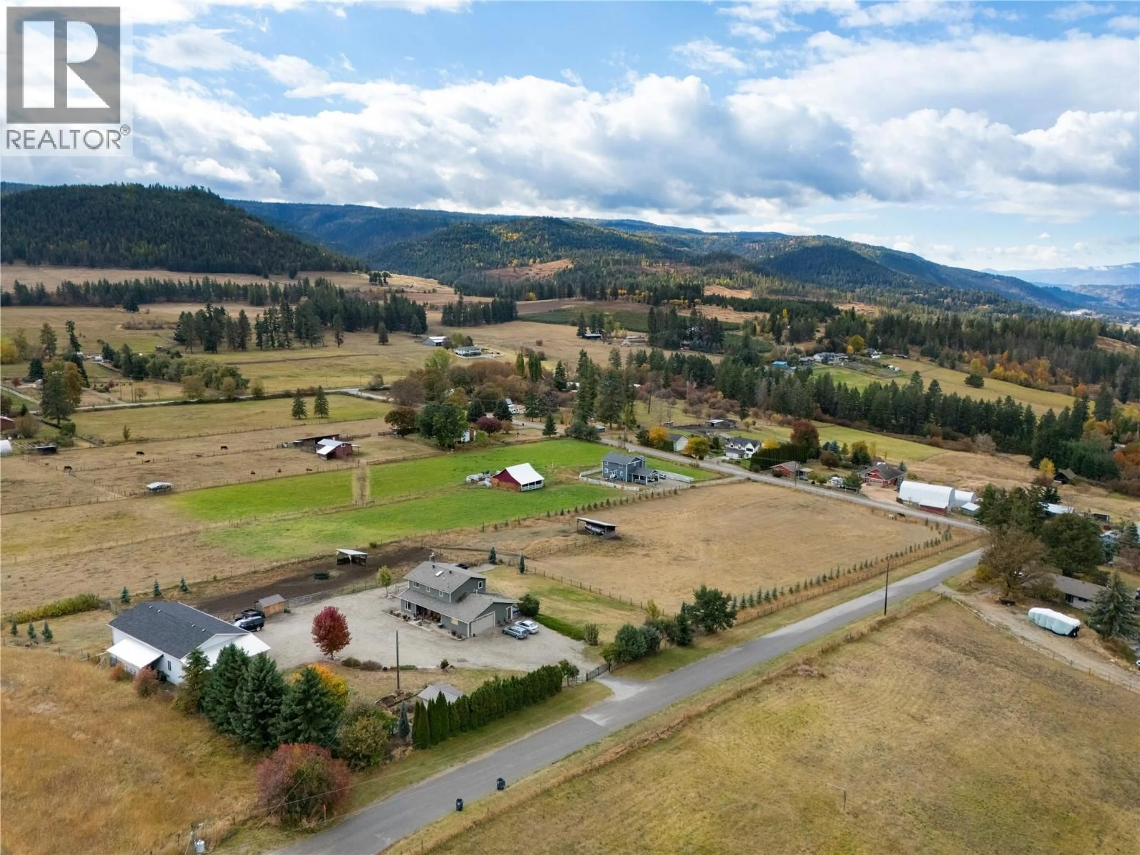 A pic from outside/outdoor area/front of a property/back of a property/a pic from drone, mountain view for 5432 ROCHDELL ROAD, Coldstream British Columbia V1B3E8