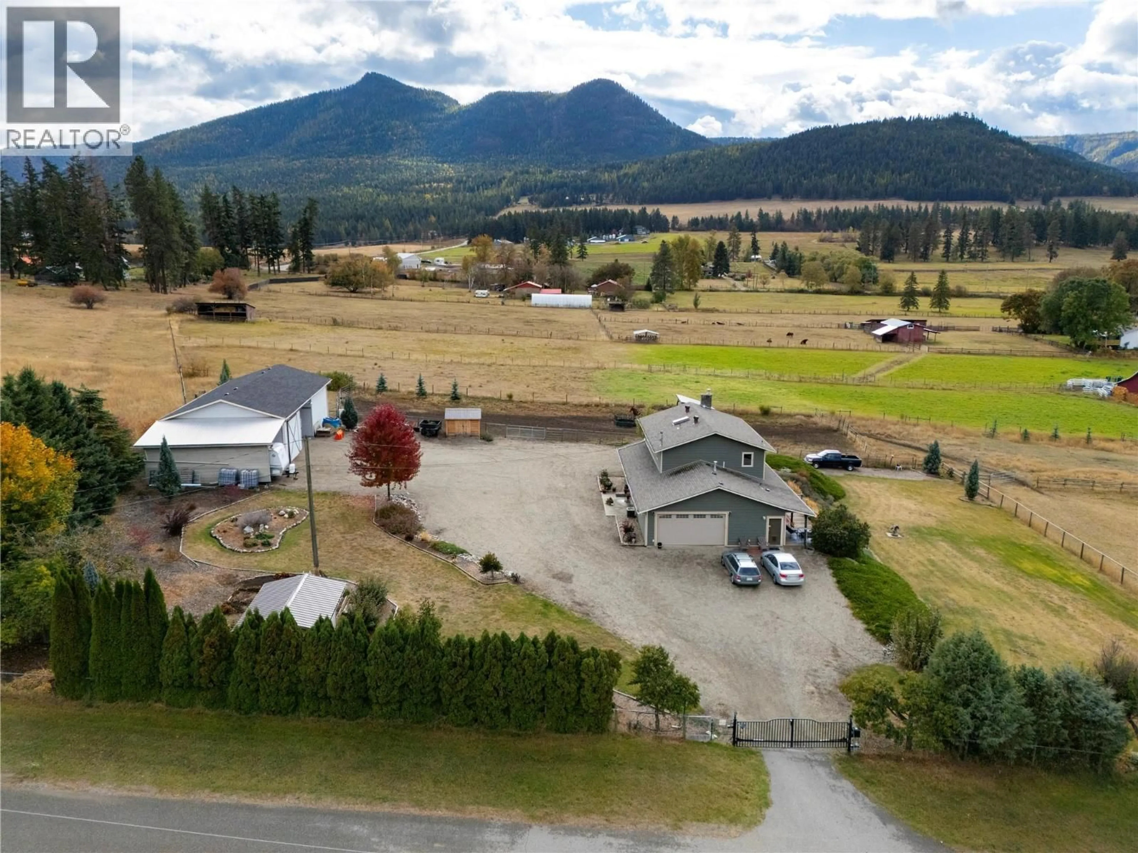 A pic from outside/outdoor area/front of a property/back of a property/a pic from drone, mountain view for 5432 ROCHDELL ROAD, Coldstream British Columbia V1B3E8