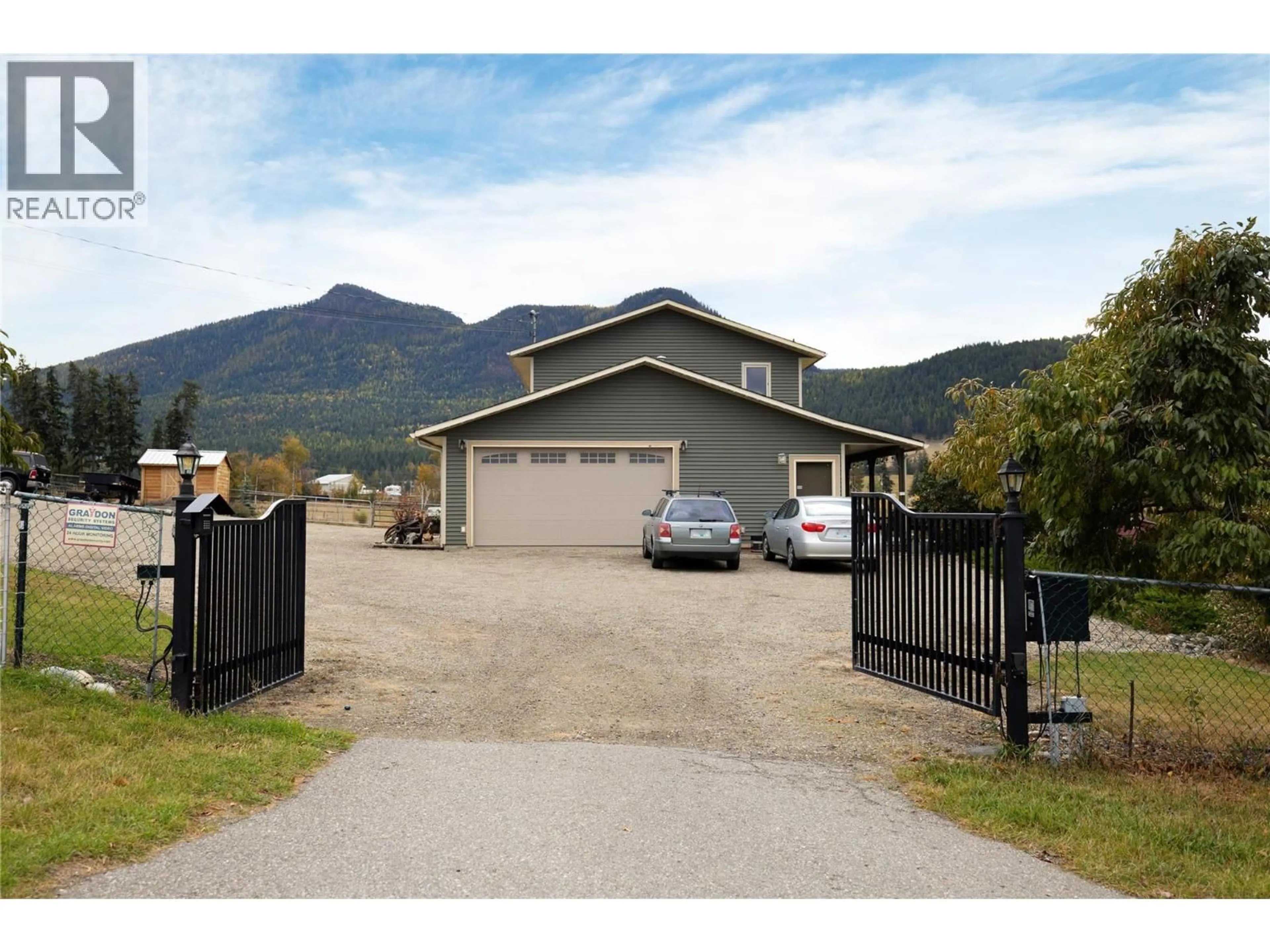 A pic from outside/outdoor area/front of a property/back of a property/a pic from drone, mountain view for 5432 ROCHDELL ROAD, Coldstream British Columbia V1B3E8